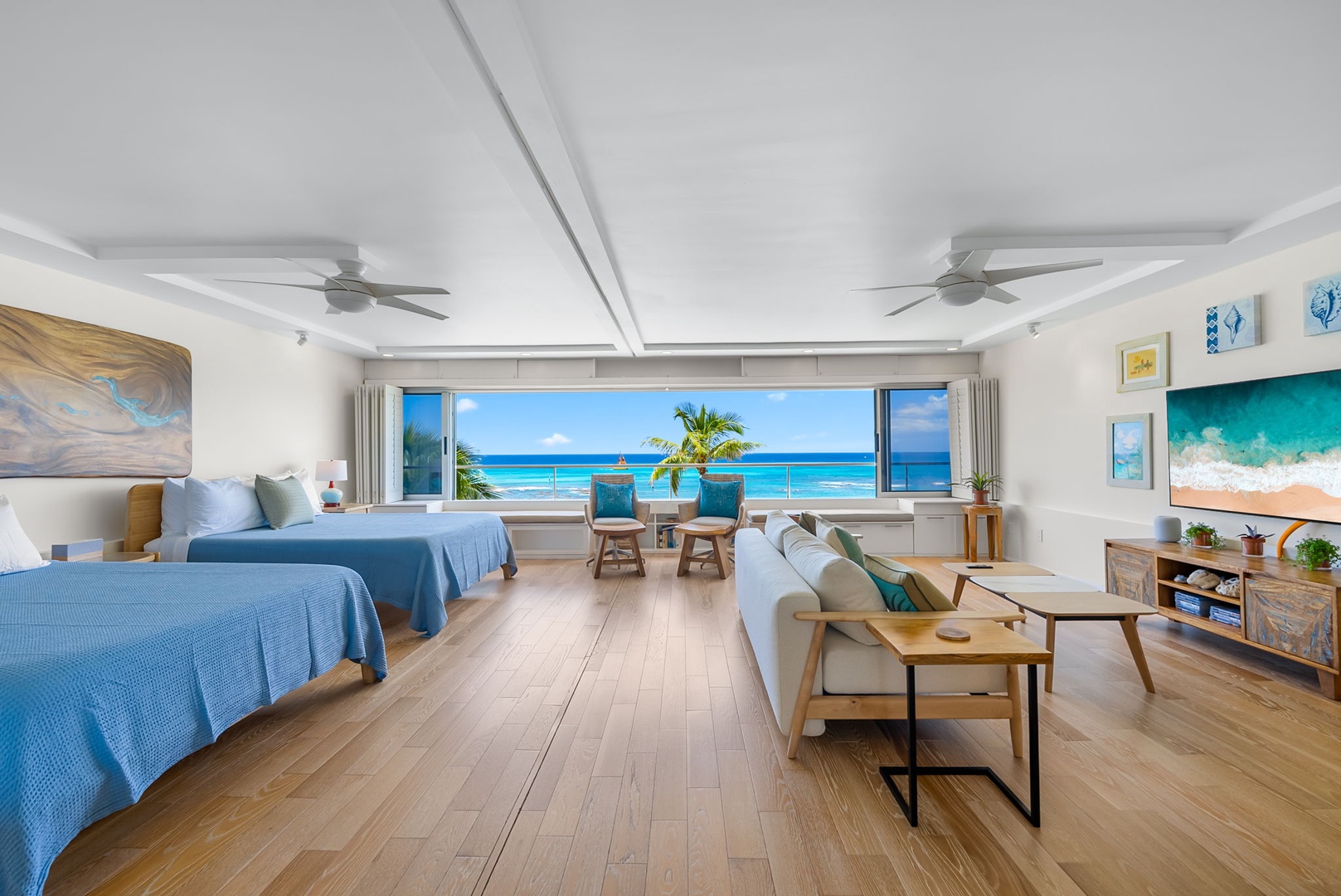 Honolulu Vacation Rentals, Colony Surf Luxe - Spacious oceanfront layout with queen beds and sofa sleeper, where beach days lead to restful nights and panoramic dreams.