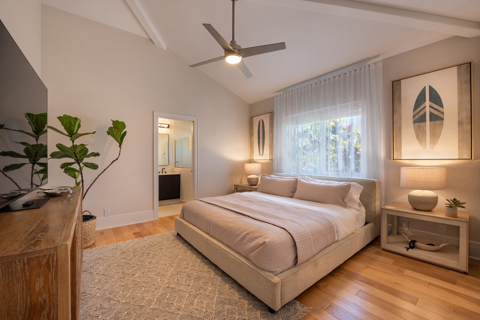 Princeville Vacation Rentals, Hihimanu House - Stylish guest bedroom with a king-size bed and charming decor.