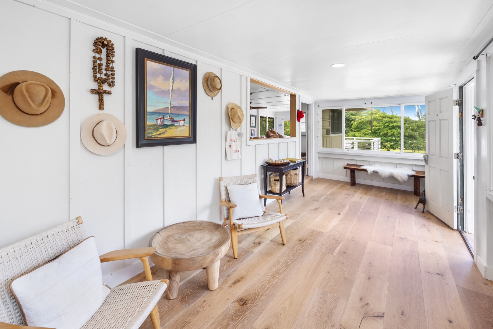 Kahuku Vacation Rentals, Hale Pellicano - This bright and airy sitting area is perfect for your morning coffee or enjoying a quiet moment.