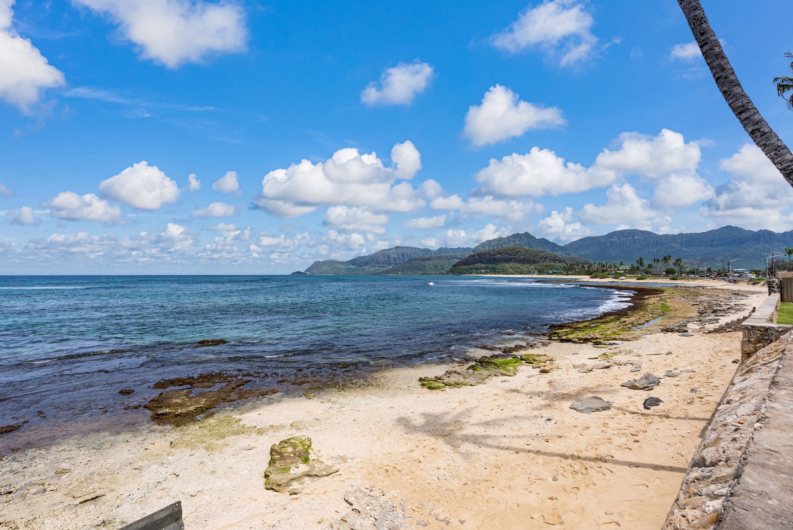 Waianae Vacation Rentals, Ma'ili Blue Estate - Pristine tropical beach with dramatic mountain backdrop and crystal-clear waters stretching to the horizon.