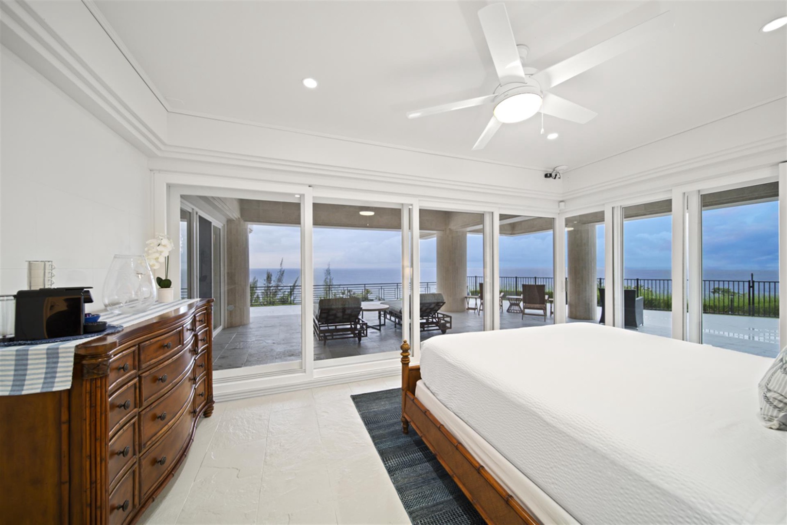 Ninole Vacation Rentals, Waterfalling Estate** - Guest Room #4 (1st floor) w/king bed, panoramic ocean views & full en suite bath.