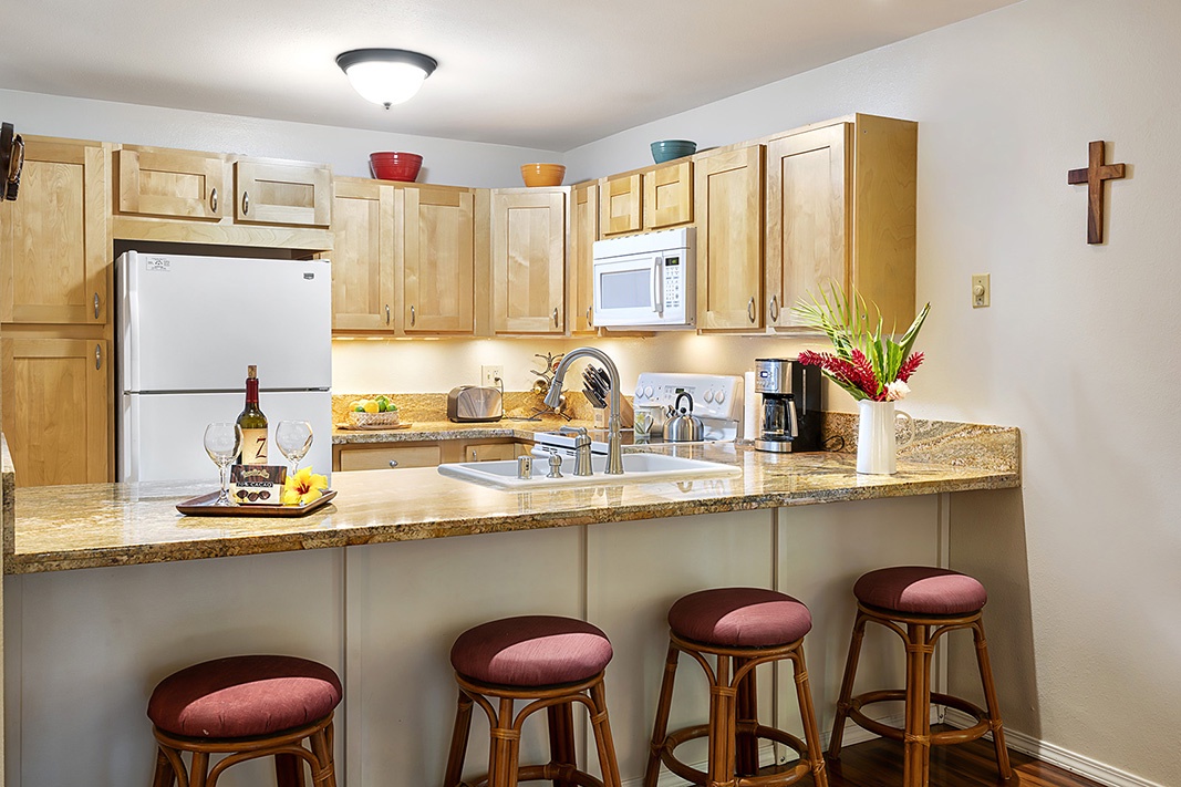 Waikoloa Vacation Rentals, Waikoloa Villas F-100 - Upgraded kitchen with breakfast bar