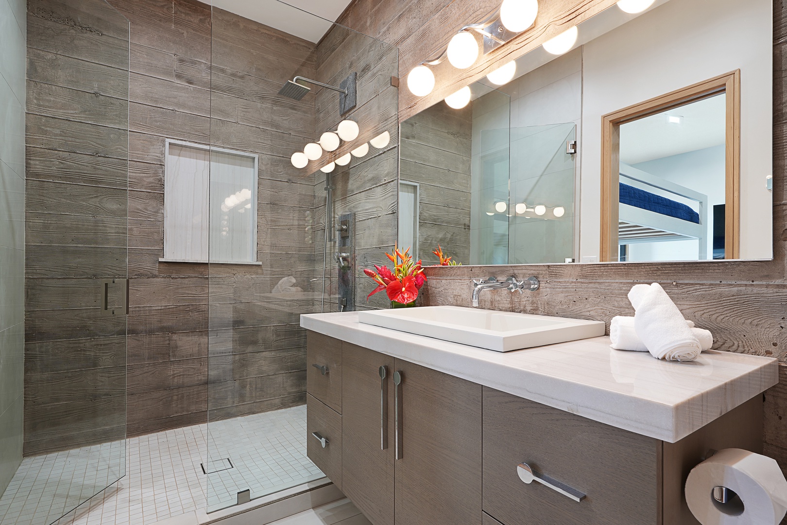 Koloa Vacation Rentals, Hale Keaka at Kukui'ula - Rejuvenate in this modern bunk room ensuite, complete with sleek finishes, a spacious shower, and vibrant touches of color for a refreshing start or end to your day.