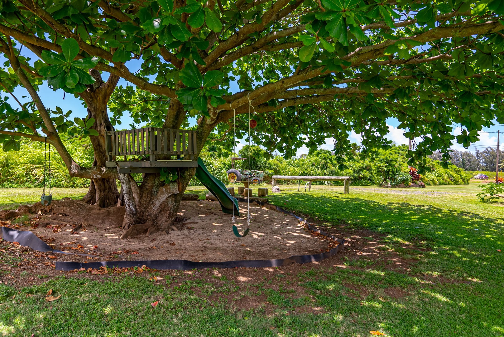 Hauula Vacation Rentals, Mau Loa Hale - Watch their imagination blossom in our dedicated kids' play area, where every moment is filled with joy and laughter.