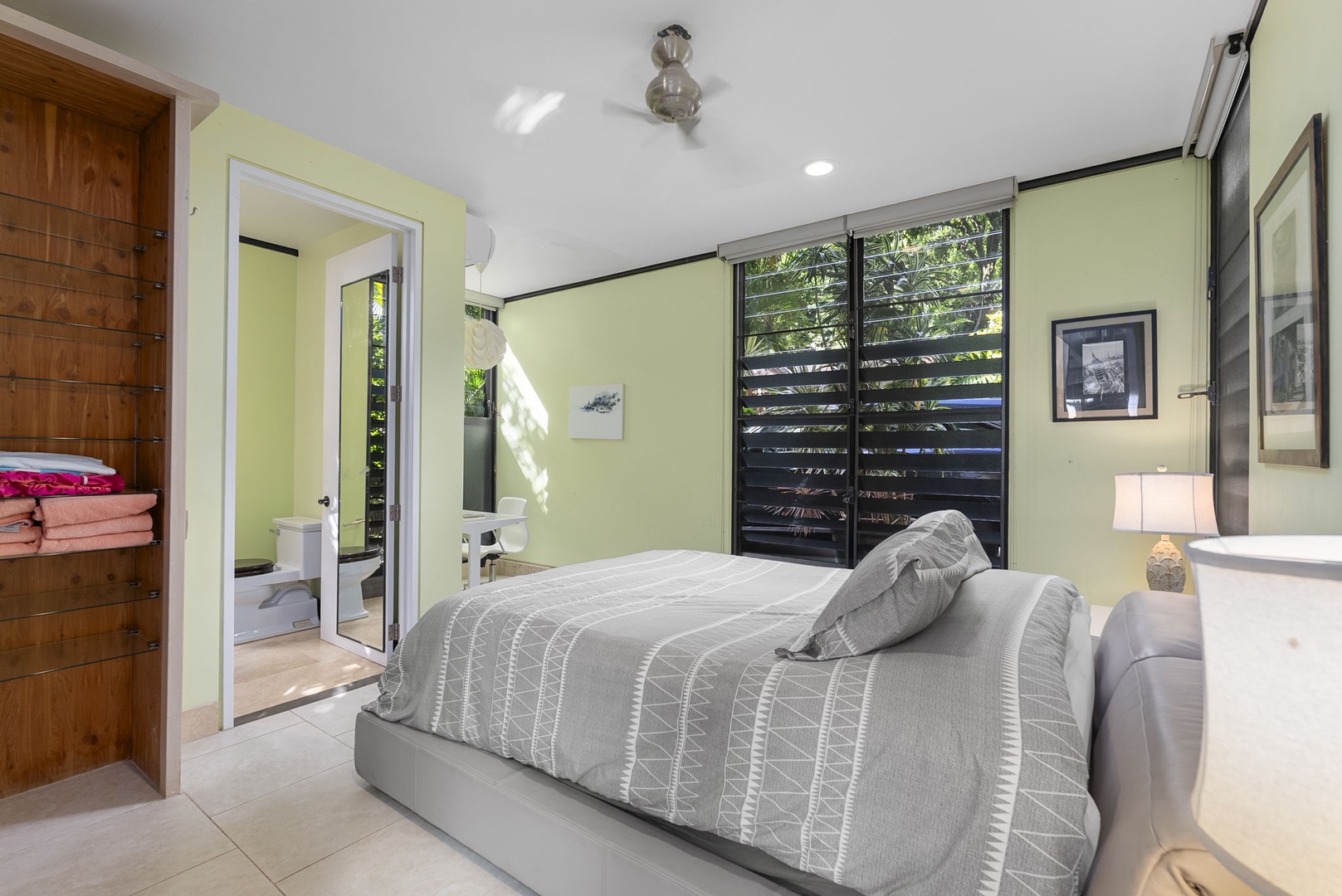 Honolulu Vacation Rentals, Tantalus Glass House (3 BD) - Wake up to filtered sunlight streaming through your bedroom's tropical louvered windows, where air conditioning keeps you comfortable year-round.