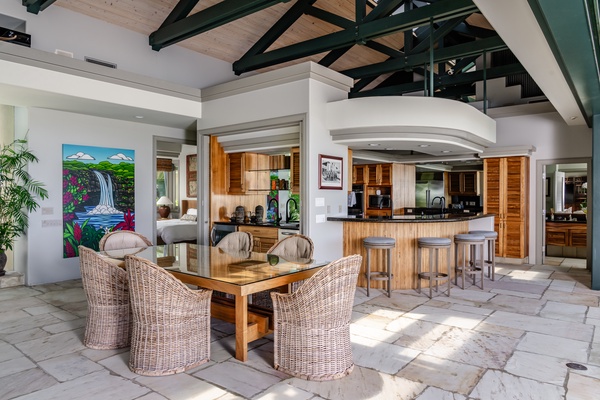Kamuela Vacation Rentals, Canoe House & Beach Walker at Champion Ridge - Open-concept dining and kitchen area with comfortable seating and a large island.