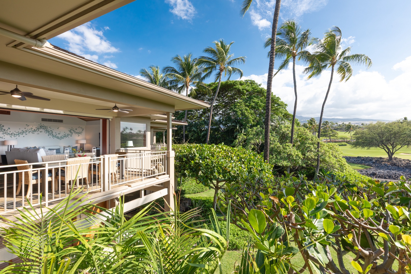 Kailua Kona Vacation Rentals, 3BD Waiulu Villa (111D) at Hualalai Resort - Tropical property surrounded by swaying palms and lush landscaping offers a peaceful Hawaiian retreat with covered outdoor spaces.