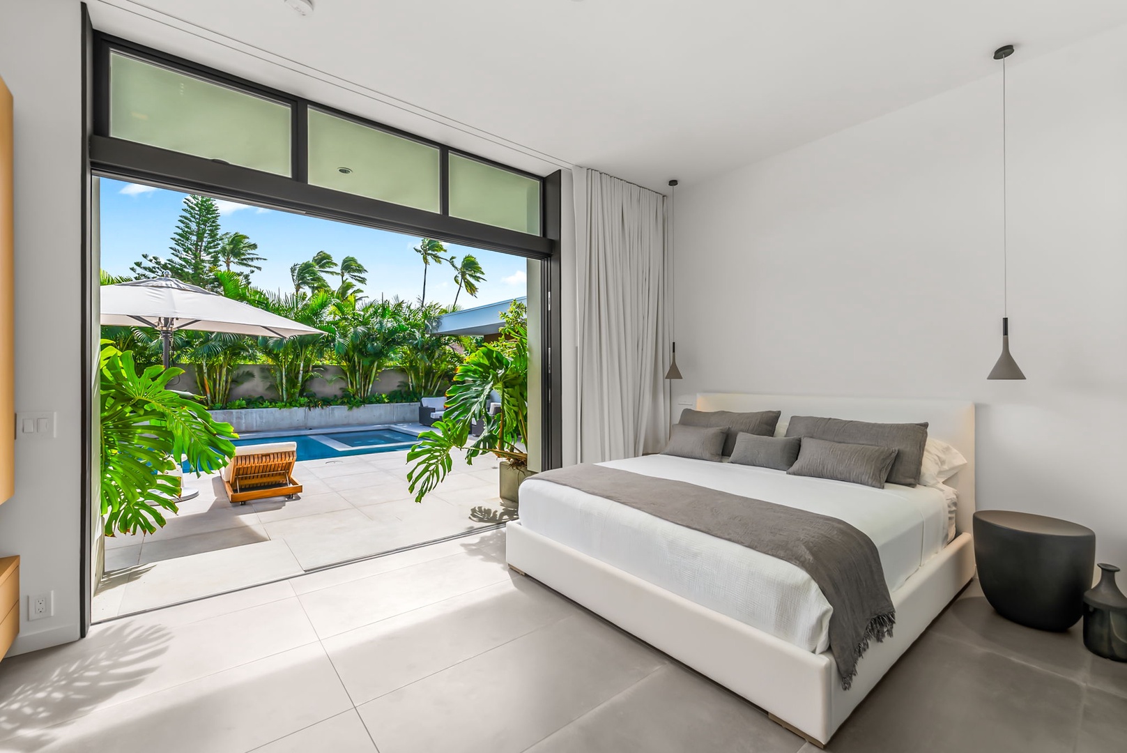 Kailua Vacation Rentals, Kailua Beach Escape - Wake to tropical greenery and step directly from your suite to the pool terrace.