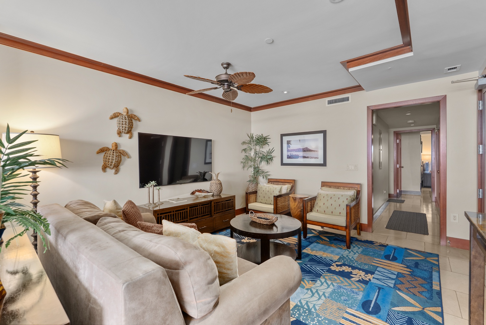 Kapolei Vacation Rentals, Ko Olina Beach Villas O1404 - Movie nights land on the sectional, the Smart TV set into the wall across.