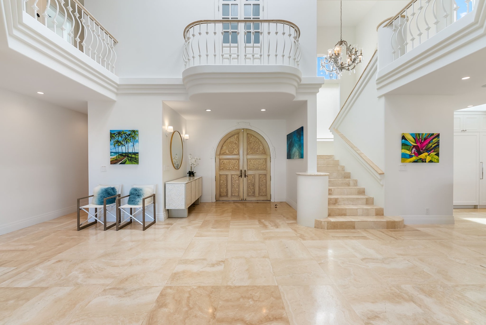 Kailua Vacation Rentals, Lanikai Sunrise Estate - Elegant split-level staircase beneath a chandelier adds drama and beauty to the heart of the home.