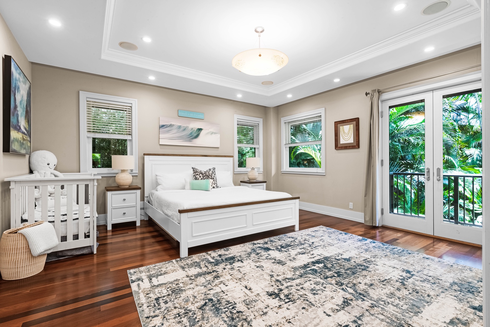 Honolulu Vacation Rentals, Pili Pono - Elegant nursery suite with area rug, natural light, and garden views.