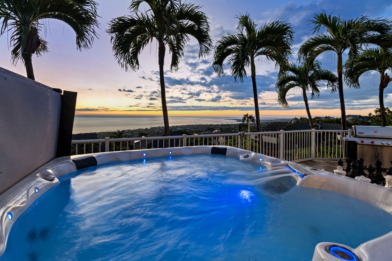 Kailua-Kona Vacation Rentals, Honu Hale - Soak in your private hot tub as palm trees sway and sunset paints the sky, creating the perfect tropical evening retreat.