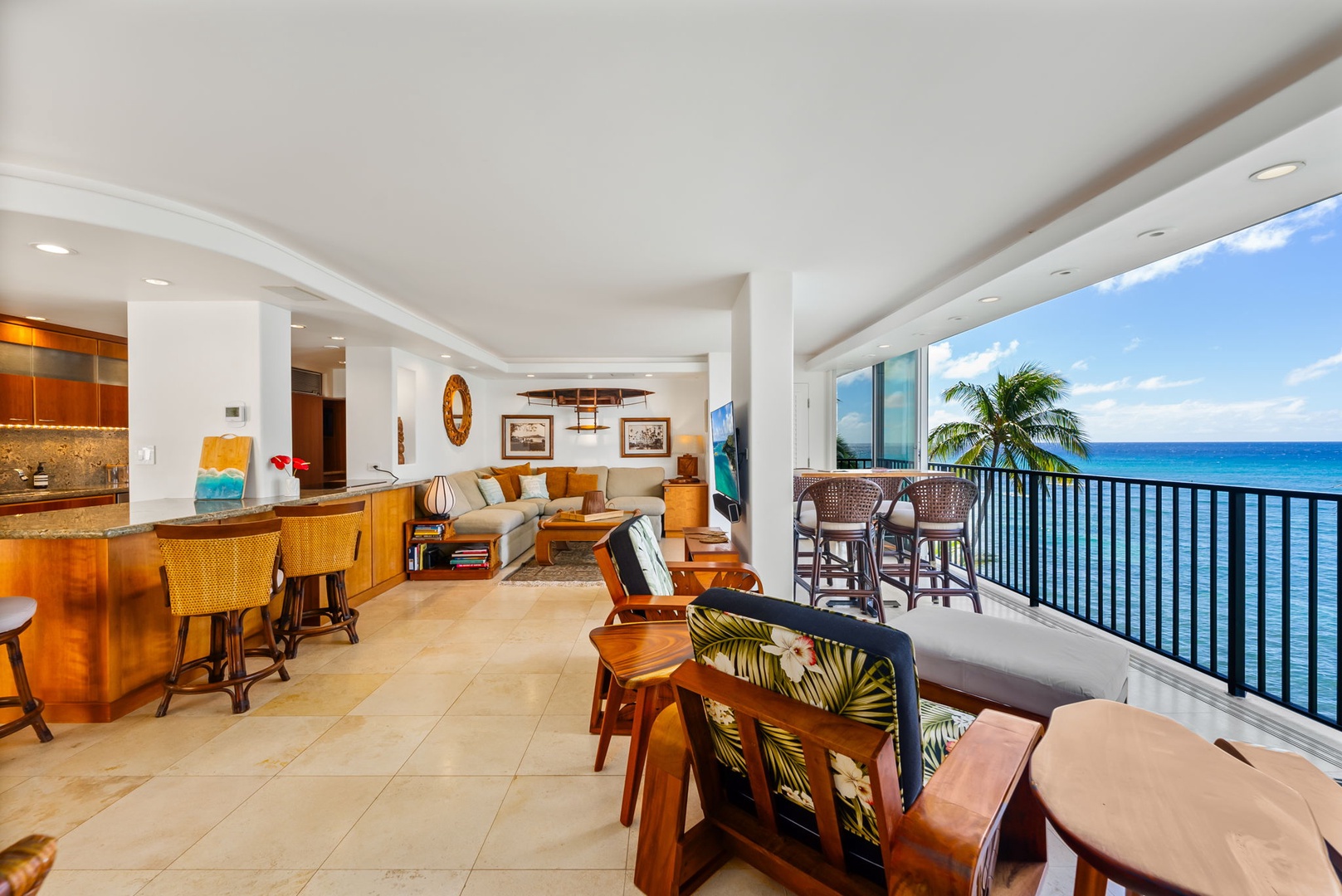 Honolulu Vacation Rentals, Kaimana Views - Bright, open living area with seamless flow to the balcony, perfect for enjoying island breezes and ocean views indoors