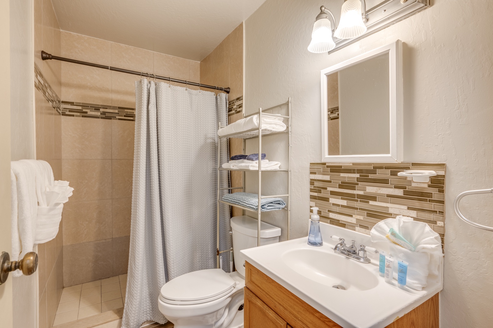 Kihei Vacation Rentals, Kihei Bay Surf B212 - Step into your private sanctuary with elegant tile work, walk-in shower, and thoughtful amenities—everything you need for a refreshing start to your day.
