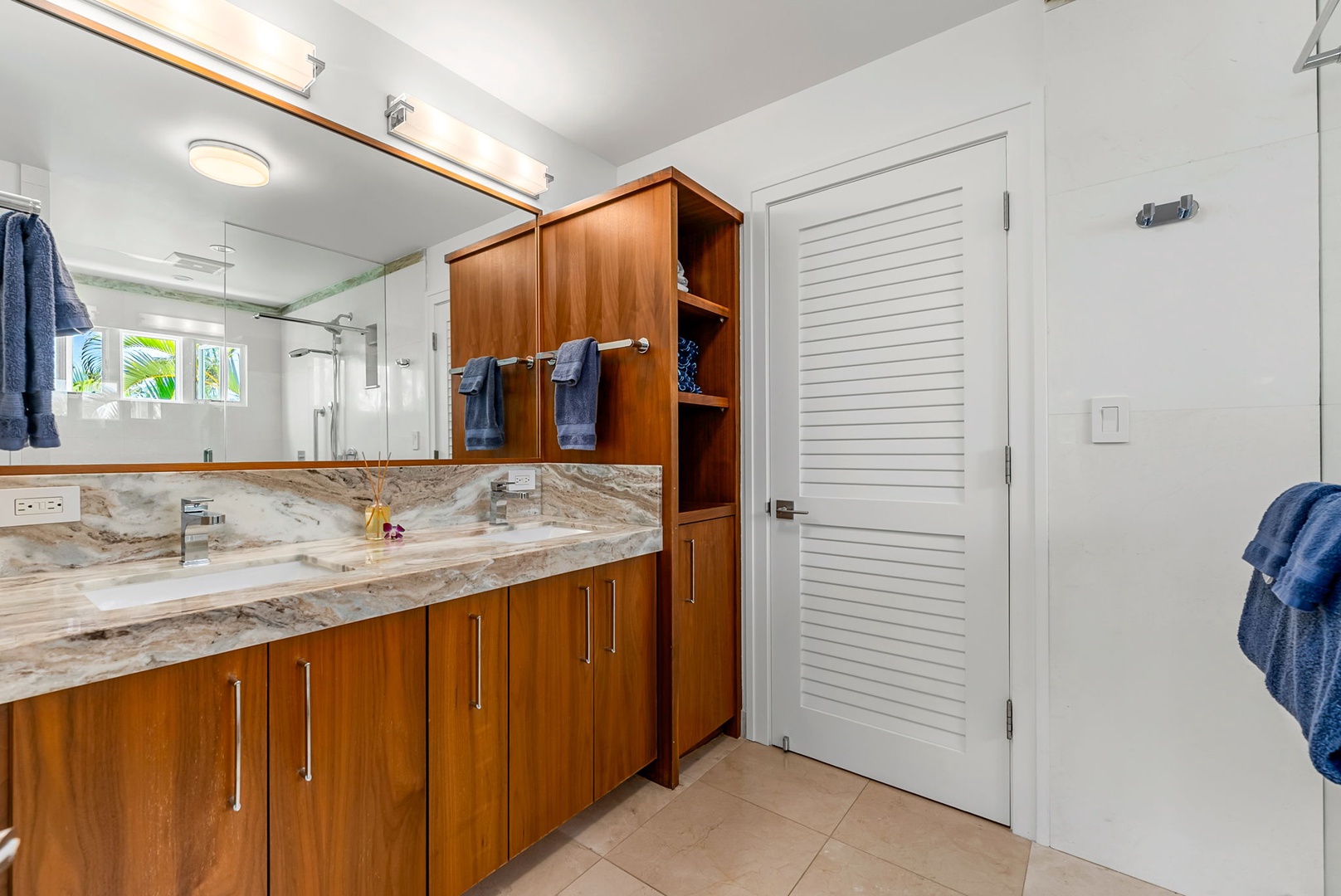 Kailua Vacation Rentals, Lanikai Sunrise Estate - Ensuite bathroom with granite countertops and clean, modern design for private convenience.
