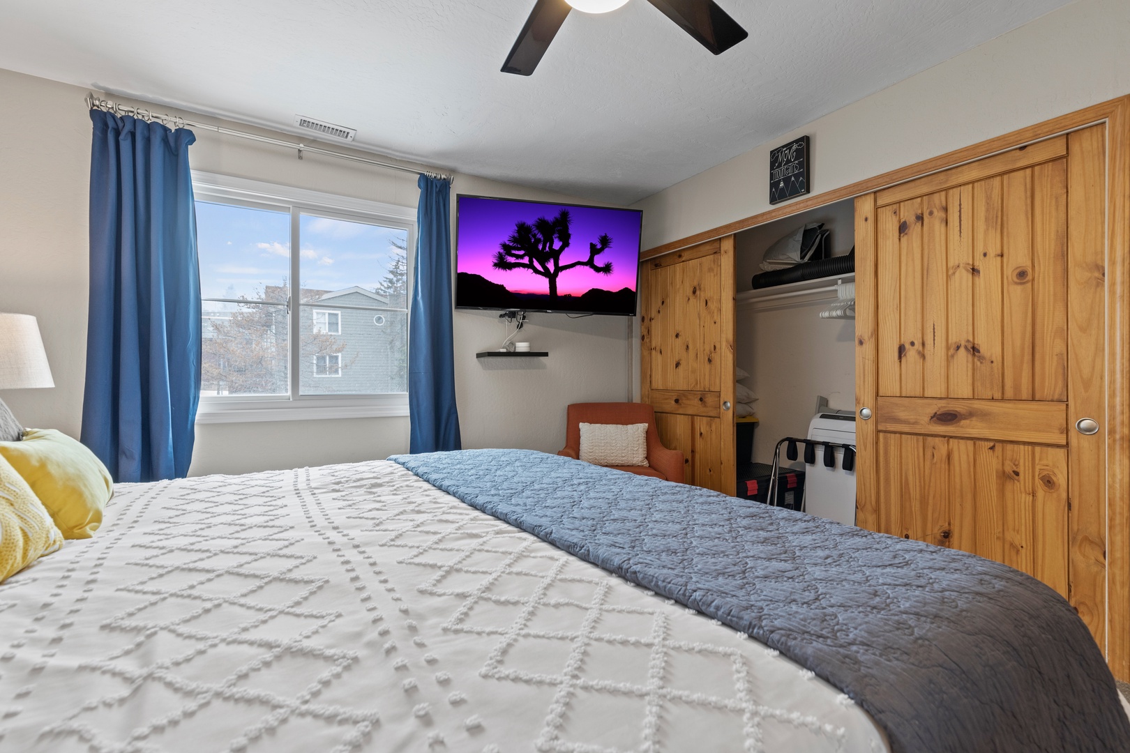 Park City Vacation Rentals, Park City Bungalow on Park Ave - This bedroom boasts a 55" flat-screen TV and a roomy closet, providing plenty of storage space for your stay