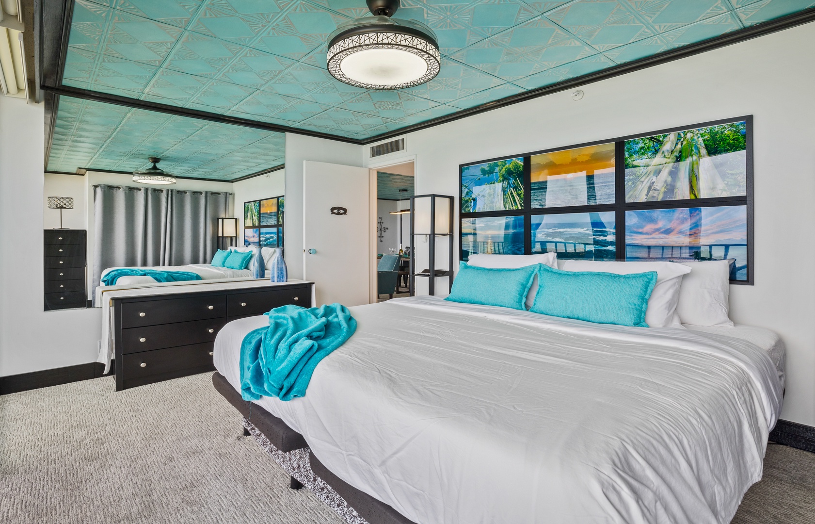 Lahaina Vacation Rentals, Valley Isle 804 - This spacious bedroom, featuring modern decor with vibrant pops of color, offers a peaceful retreat.