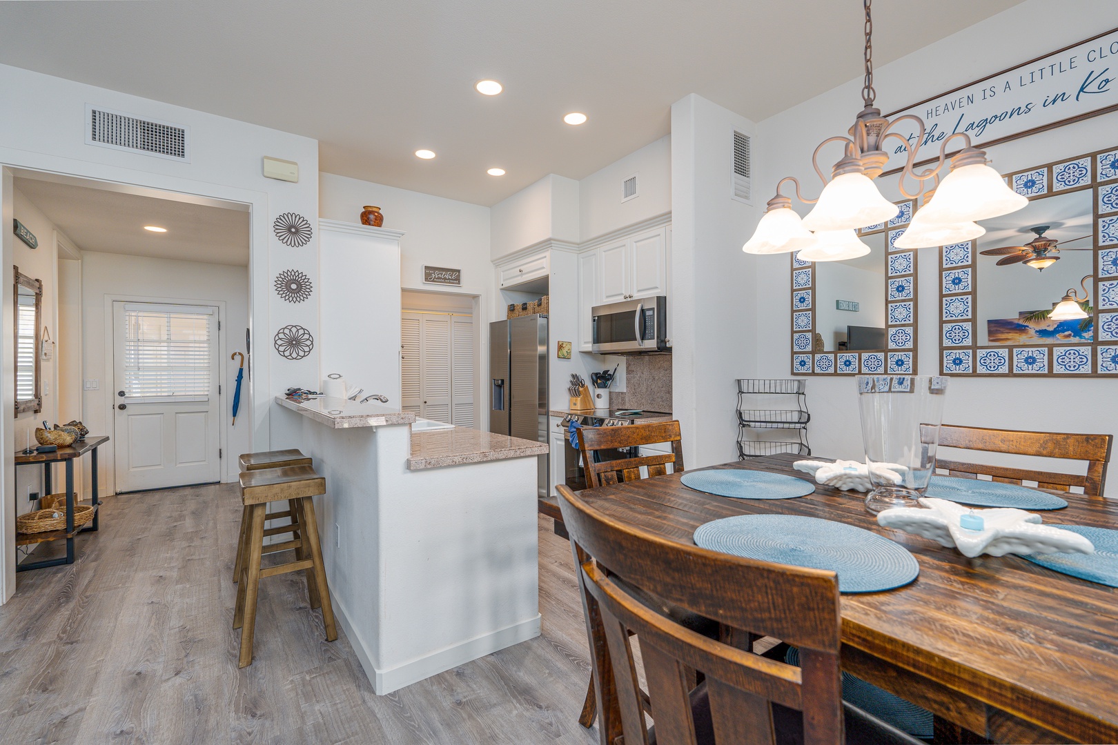 Kapolei Vacation Rentals, Coconut Plantation 1208-2 - The beautiful kitchen with bar seating.