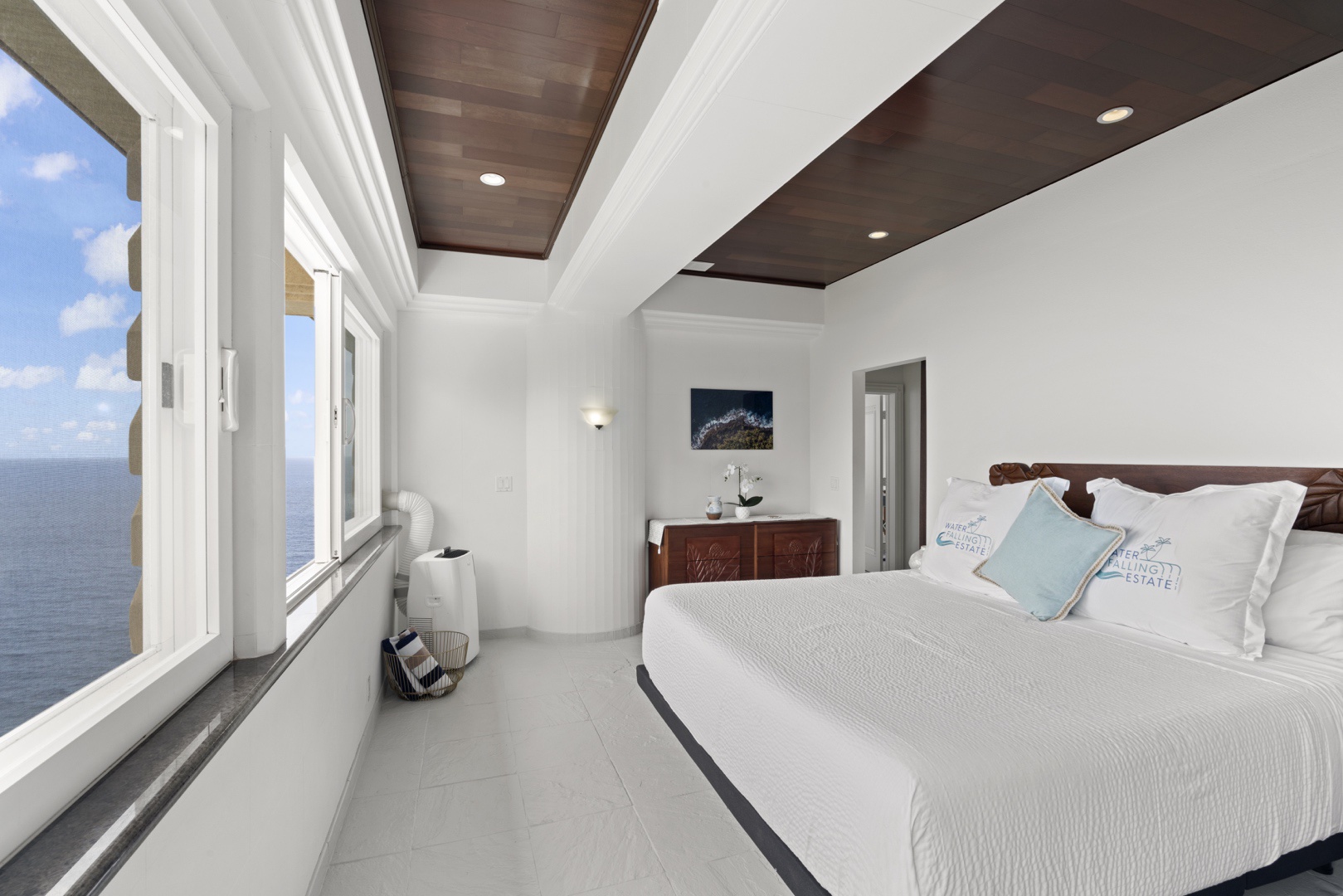 Ninole Vacation Rentals, Waterfalling Estate - Guest Room #3 (3rd floor) w/ocean and waterfall views & full en suite bath.