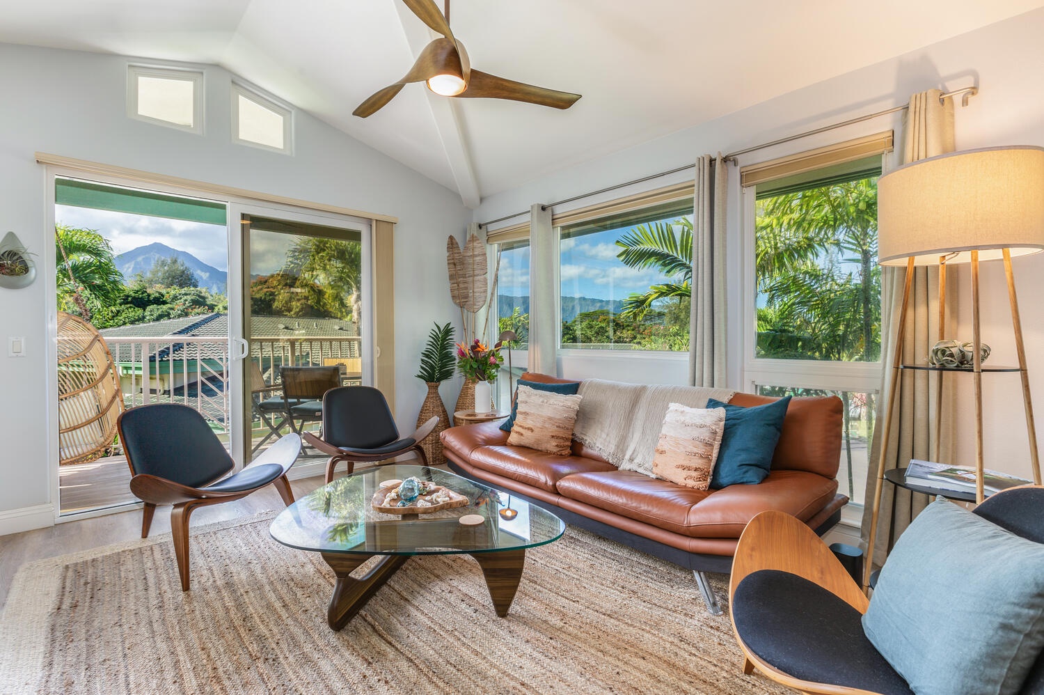 Princeville Vacation Rentals, Sea Glass - Cozy living area with plenty of seats and direct access to the lanai.