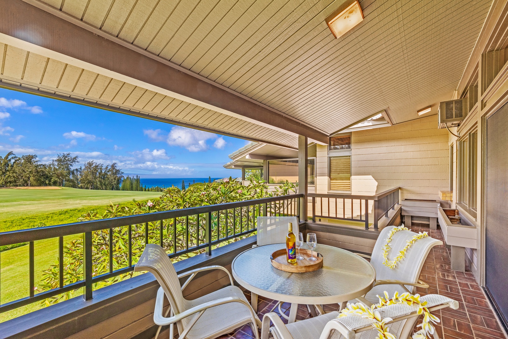 Lahaina Vacation Rentals, Kapalua Ridge 2321 - Relax on this inviting lanai, where you can enjoy ocean breezes and partial water views while dining alfresco or simply unwindin