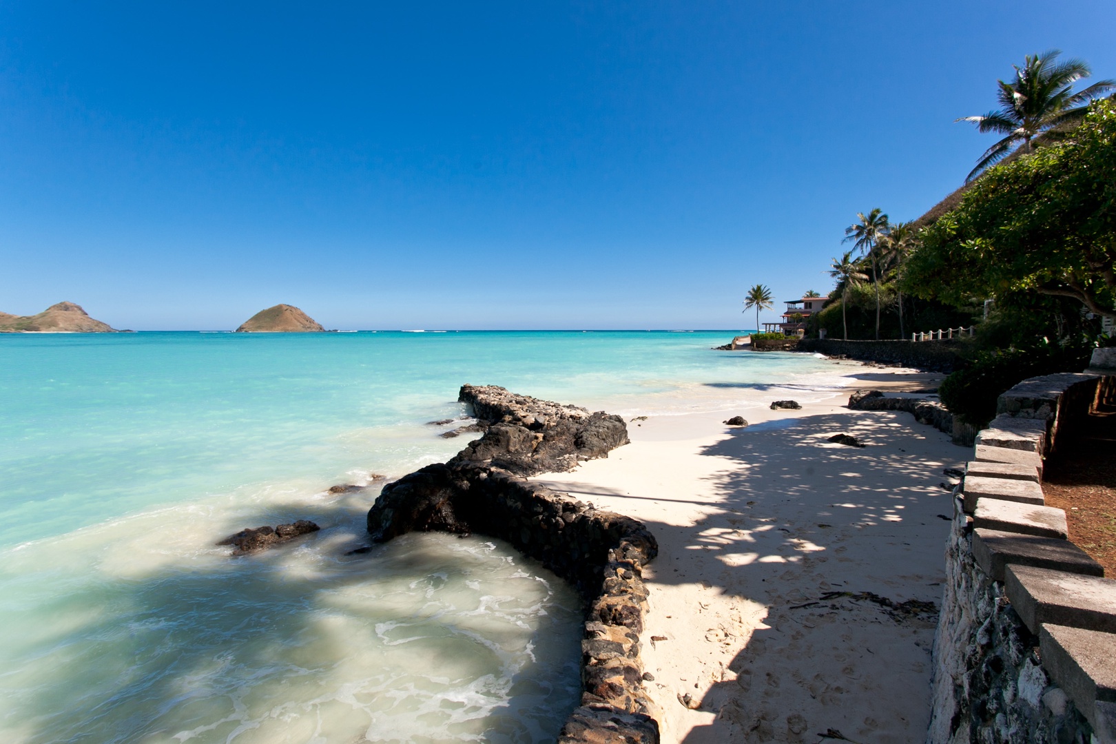 Kailua Vacation Rentals, Hale Kainalu* - The white sand beach is perfect for afternoon exploration.