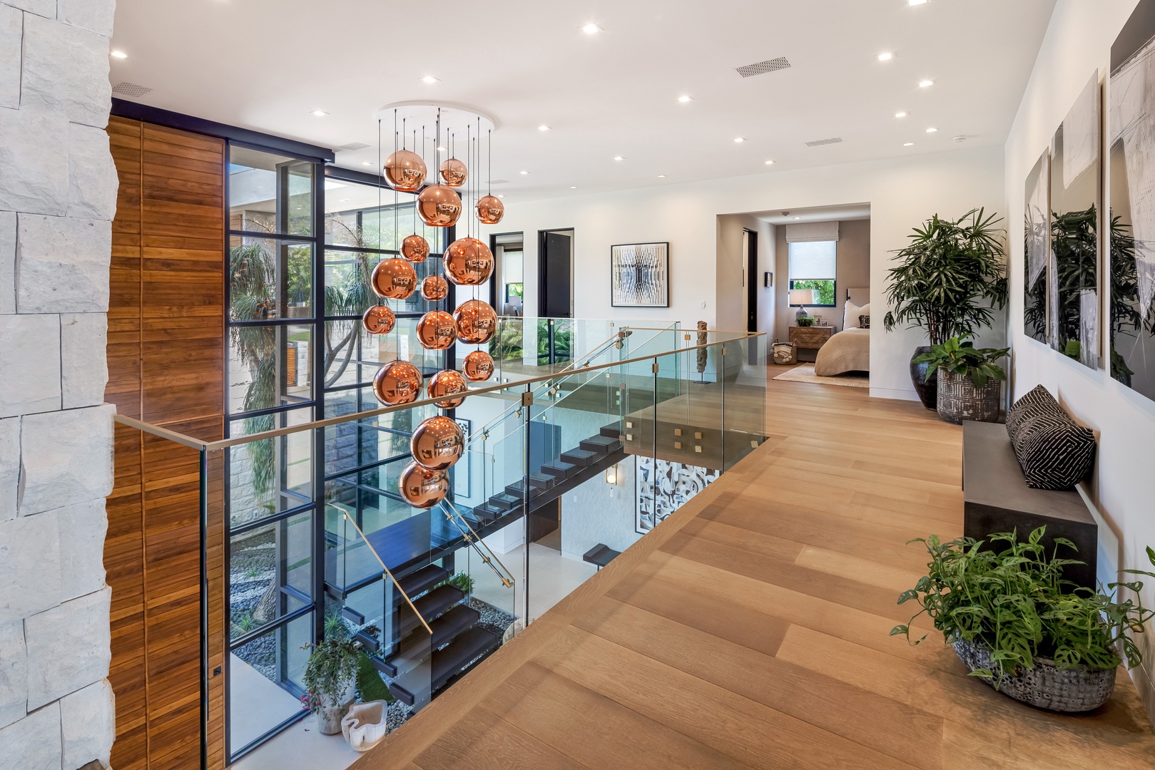 Honolulu Vacation Rentals, Diamond Head Grand Escape - Glass railings and artistic details highlight the open design of the upstairs hallway.