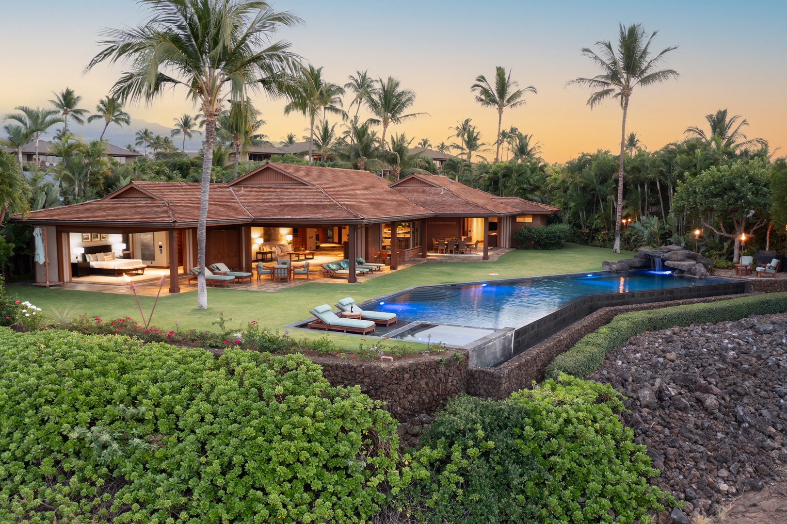 Kailua Kona Vacation Rentals, 5BD Ke Alaula Estate (144) at Hualalai Resort - Twilight ambiance at the poolside lanai with glowing sunset skies.