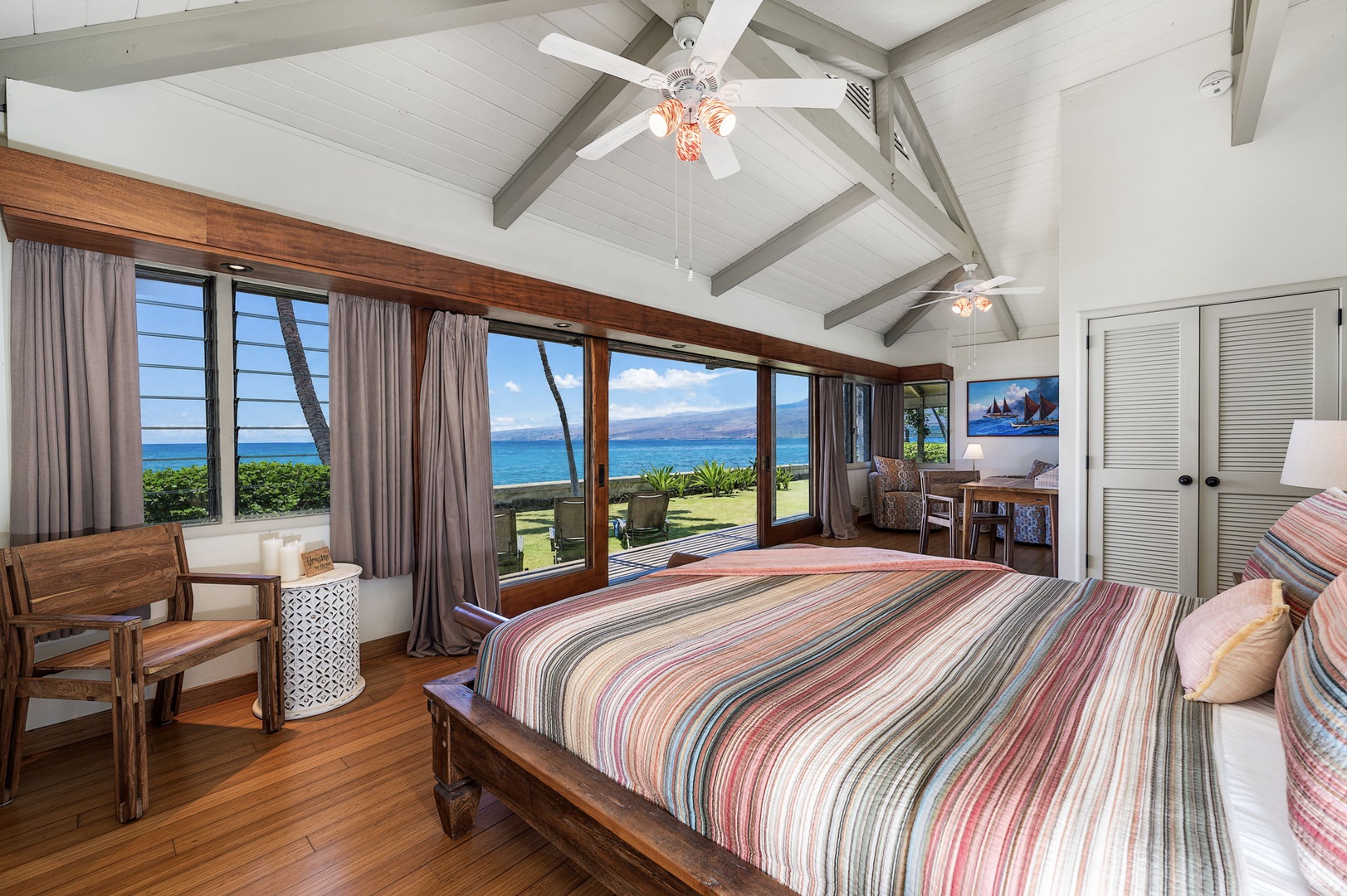 Kamuela Vacation Rentals, Island Time Retreat - Ocean and garden fill the windows beside the bed in this light-filled room.