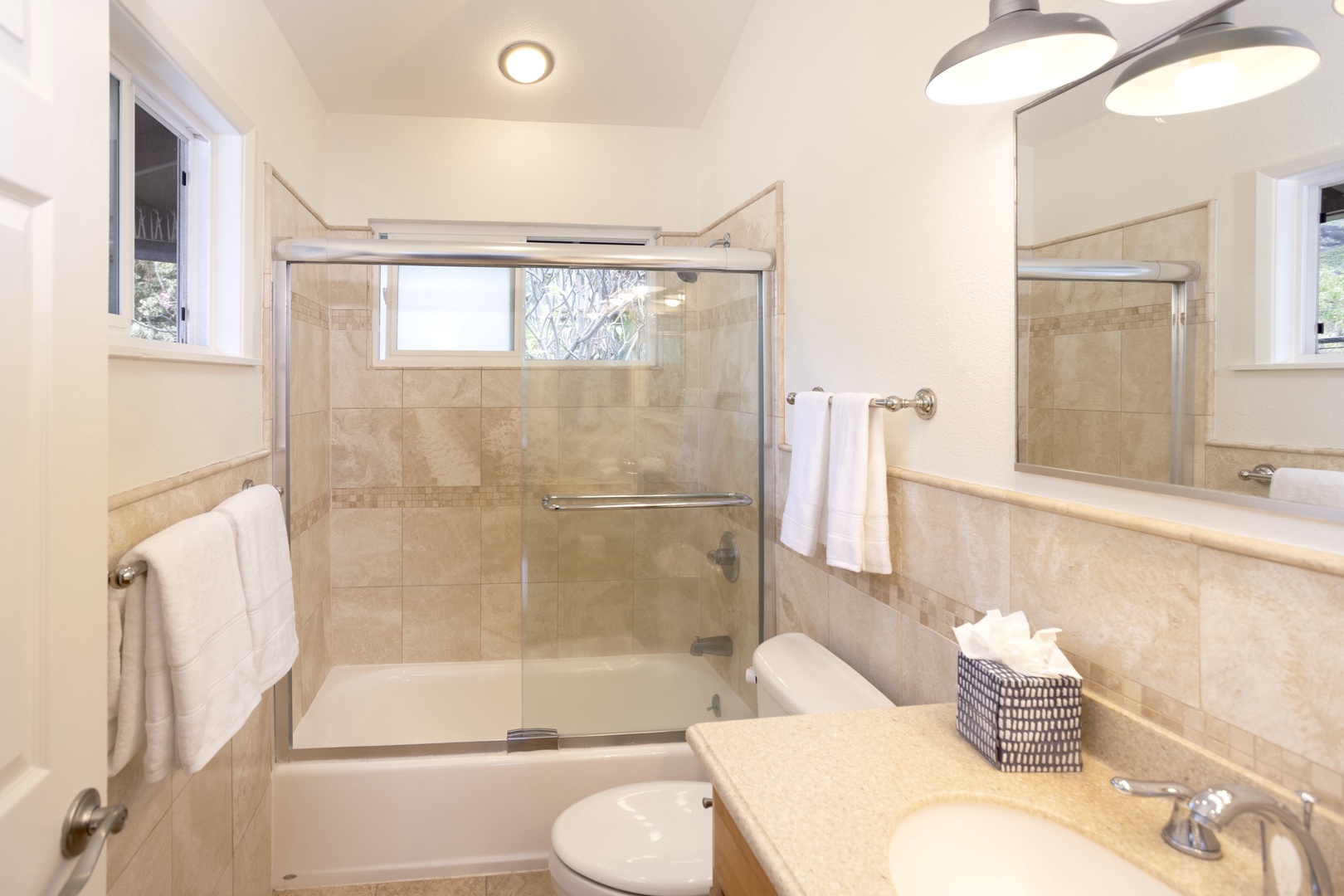 Kailua Vacation Rentals, Mokulua Seaside - Ensuite bathroom with a shower/tub combo with a glass enclosure