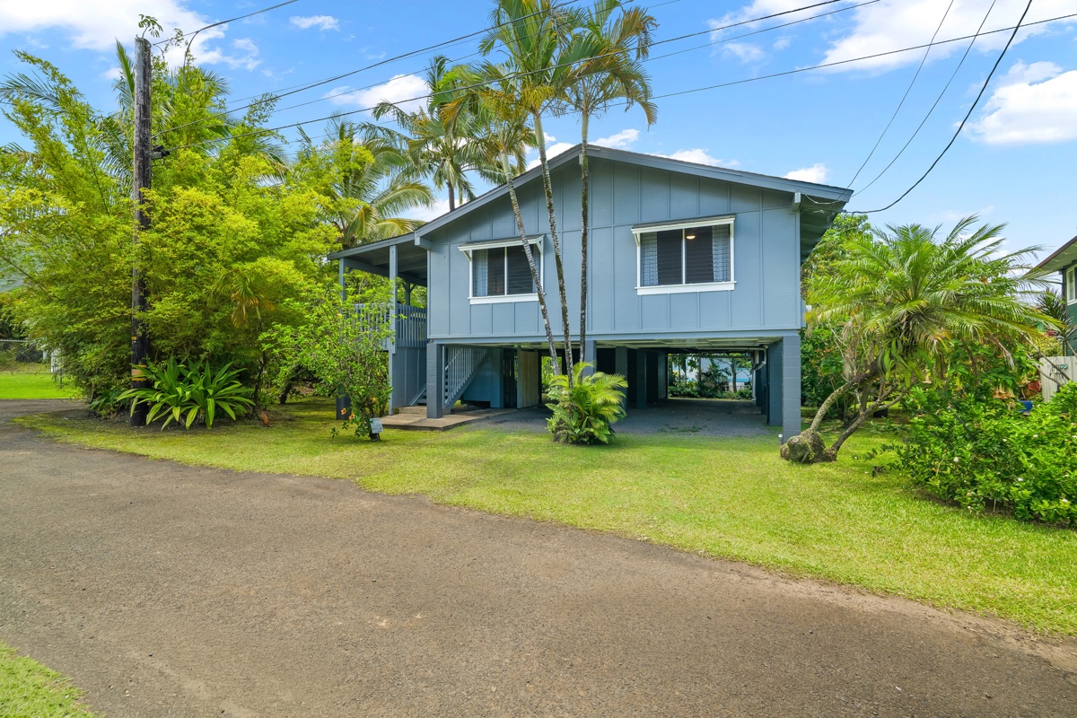 Hanalei Vacation Rentals, Hale Kanani (Kaua'i) TVNC 1342 - Come up the lawn to a plantation-style home painted the color of a calm sea.