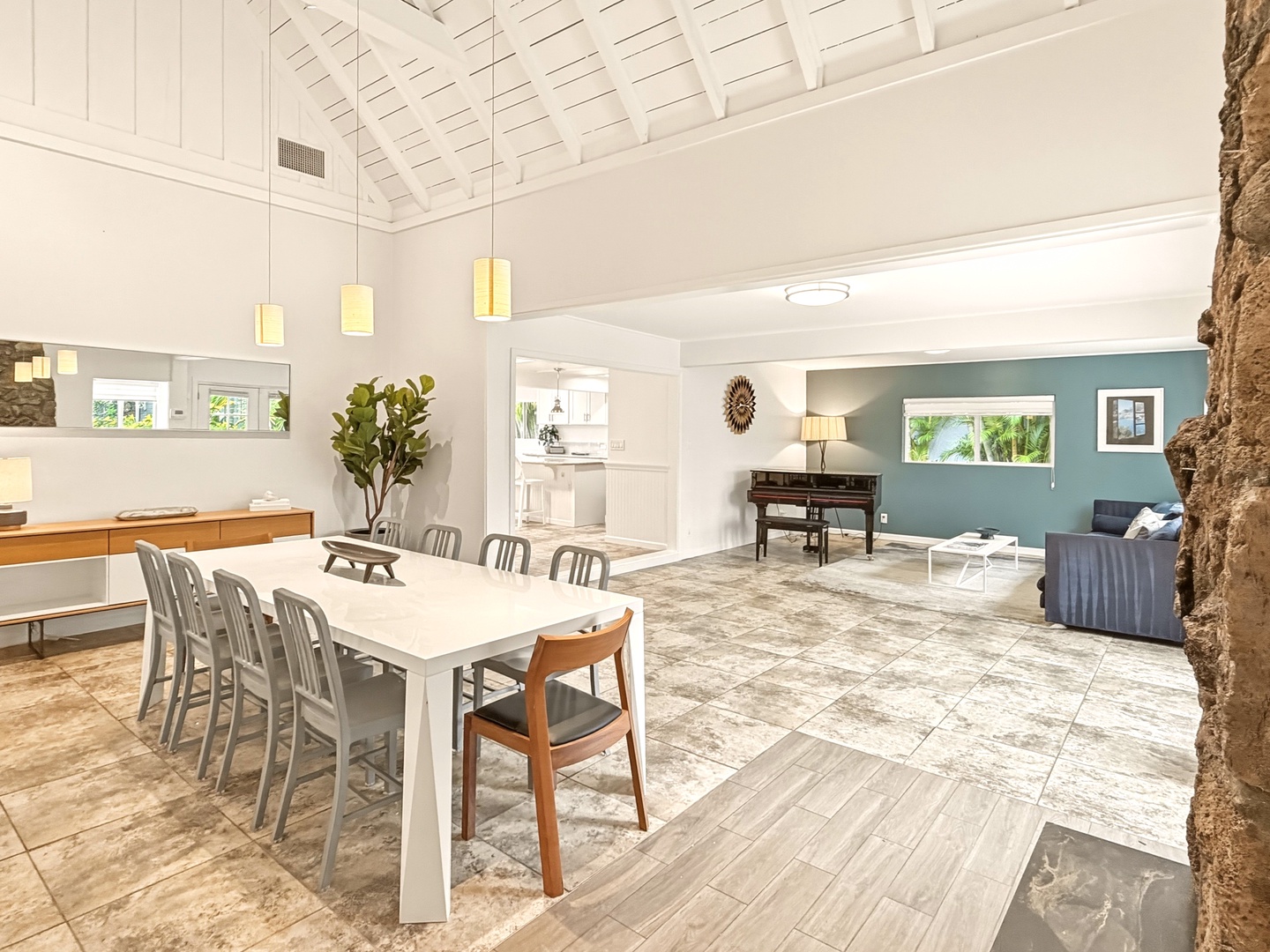 Honolulu Vacation Rentals, Ho'okipa Villa - The spacious open-plan living unfolds with soaring ceilings and natural light streaming through windows, creating an airy retreat for memorable gatherings.