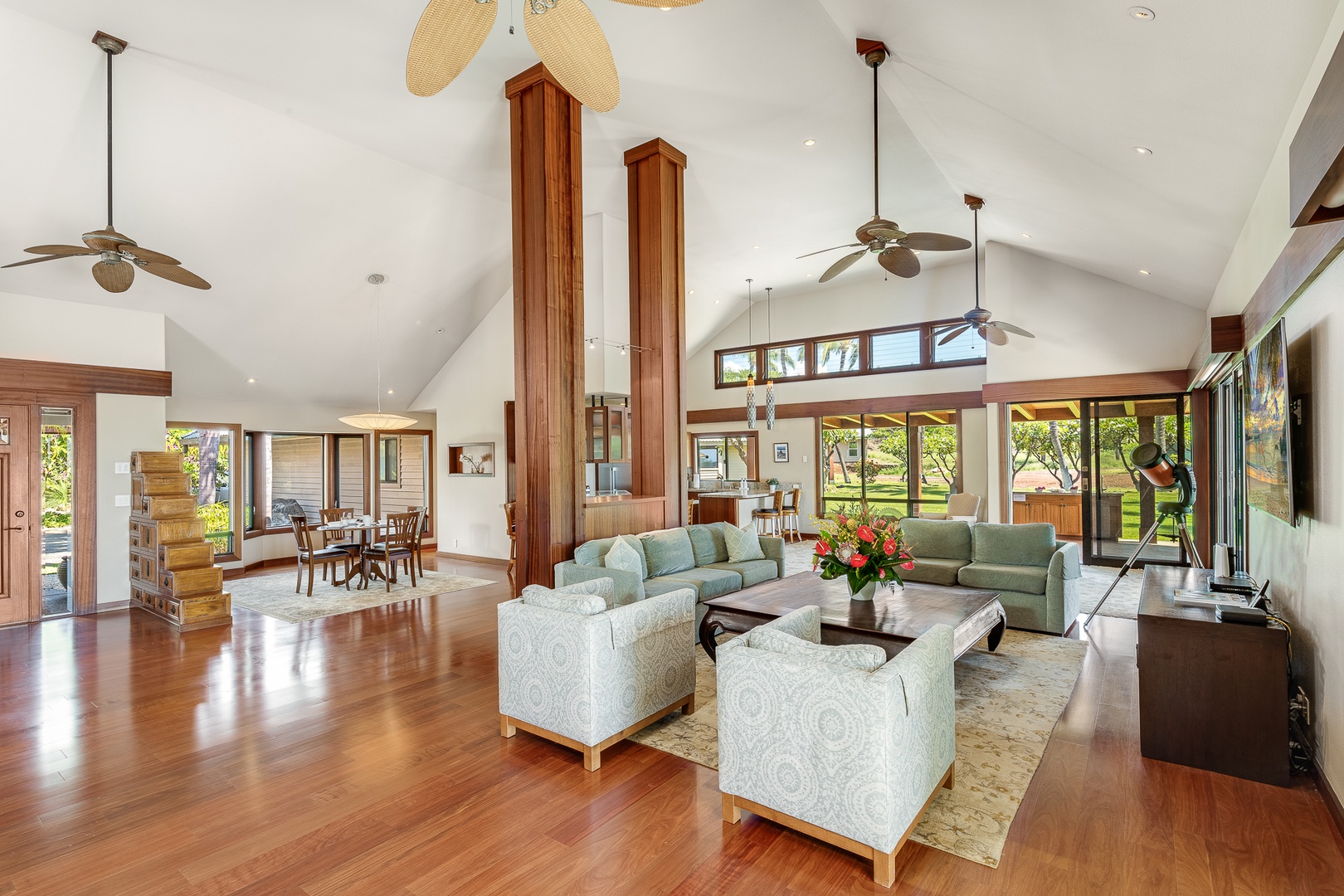 Kamuela Vacation Rentals, Olomana Hale at Kohala Ranch - The living area comes with comfortable chairs and couches to recline and enjoy your favorite shows on the large flatscreen television while peering out towards the pool and ocean views