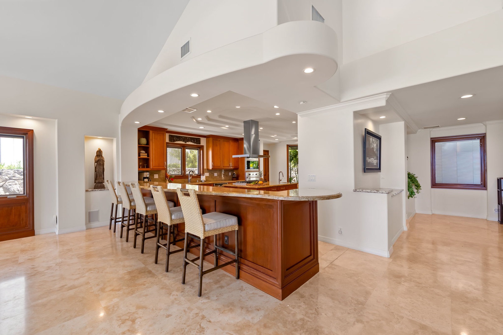 Honolulu Vacation Rentals, Maunalua Estate - Settle into the expansive kitchen and dining area, perfect for slow mornings and shared meals.