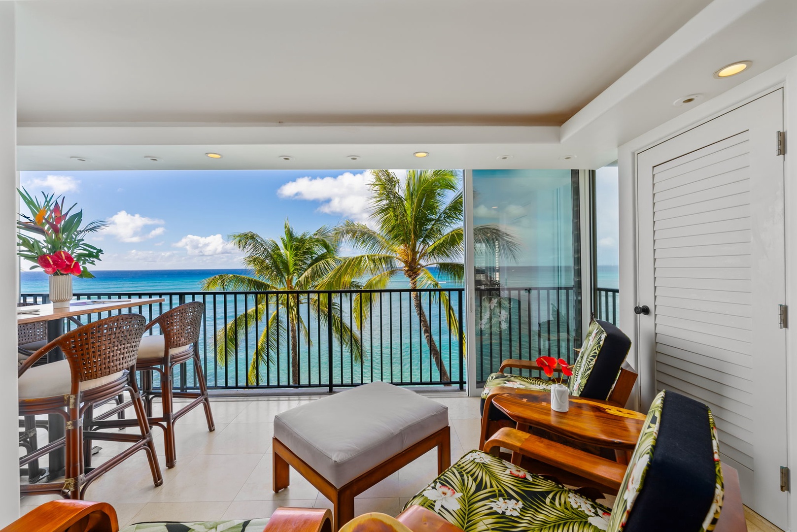 Honolulu Vacation Rentals, Kaimana Views - Private balcony with lounge chairs and ocean views—enjoy sunbathing, reading, or sipping a drink by the sea.