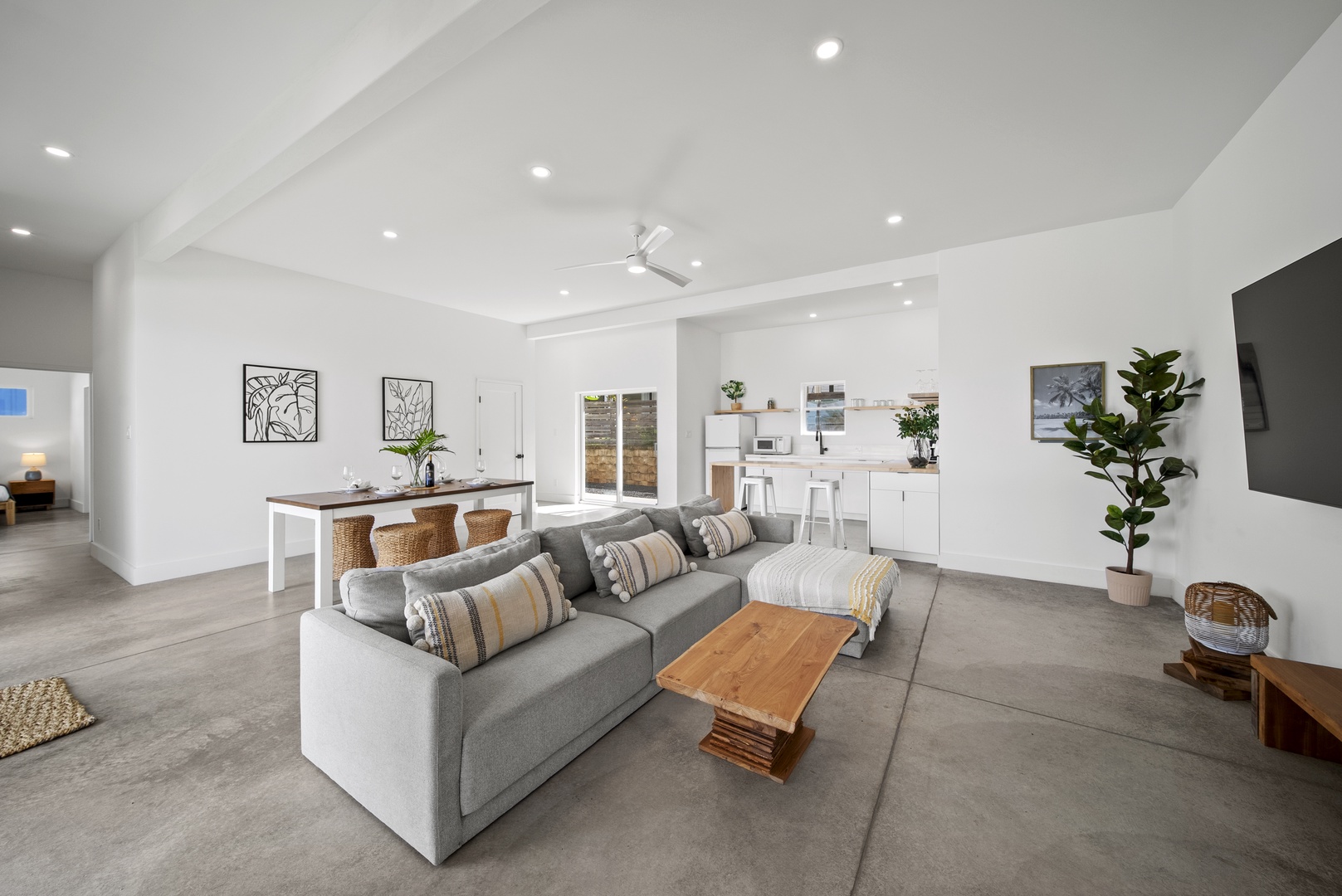 Haleiwa Vacation Rentals, Villa Bianca - The living area features plush sofas, great for movie nights and quality time together.