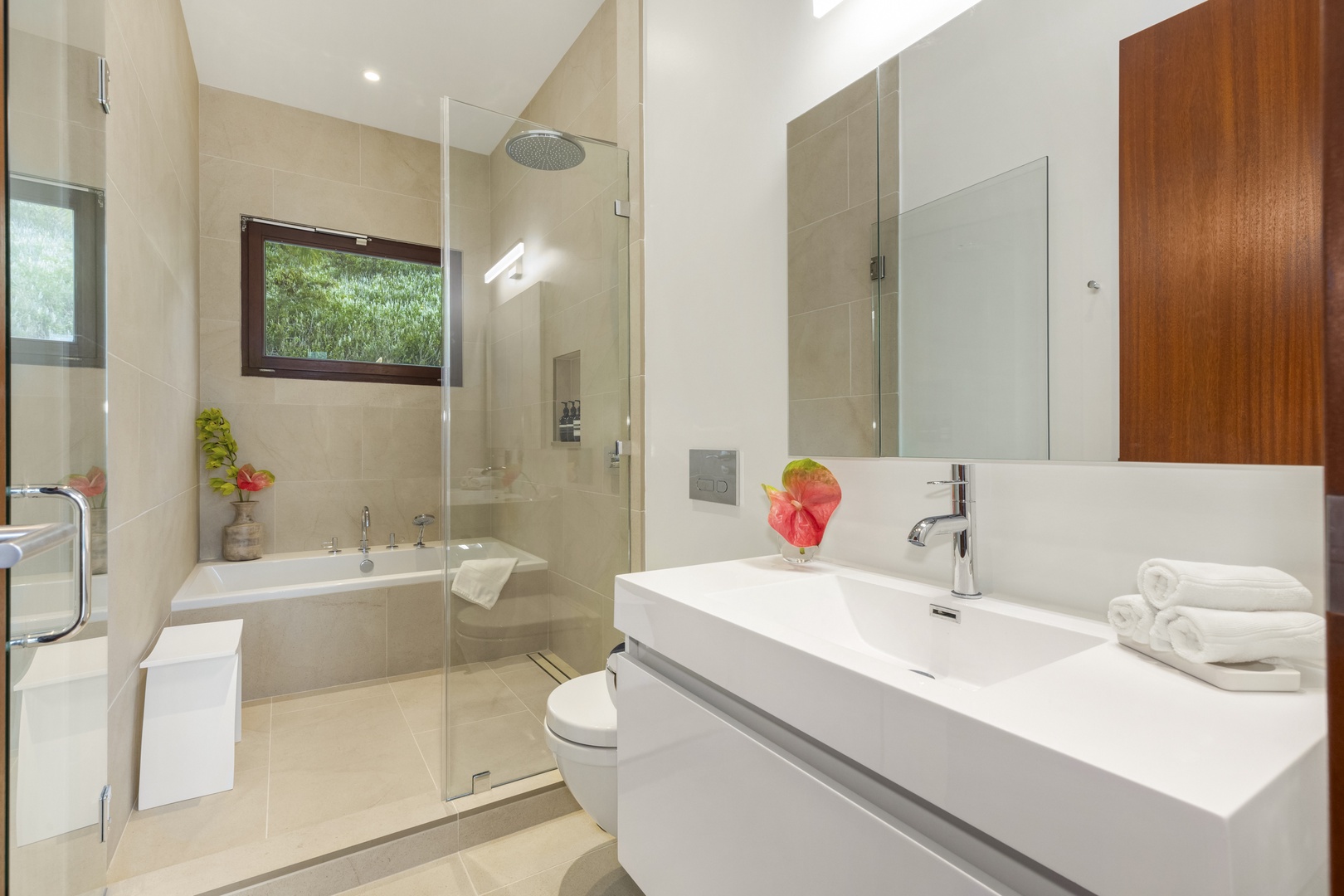 Kailua Vacation Rentals, Lanikai Hillside Estate - Guest bathroom 3 with a sleek walk-in shower and double vanity, combining style and functionality.