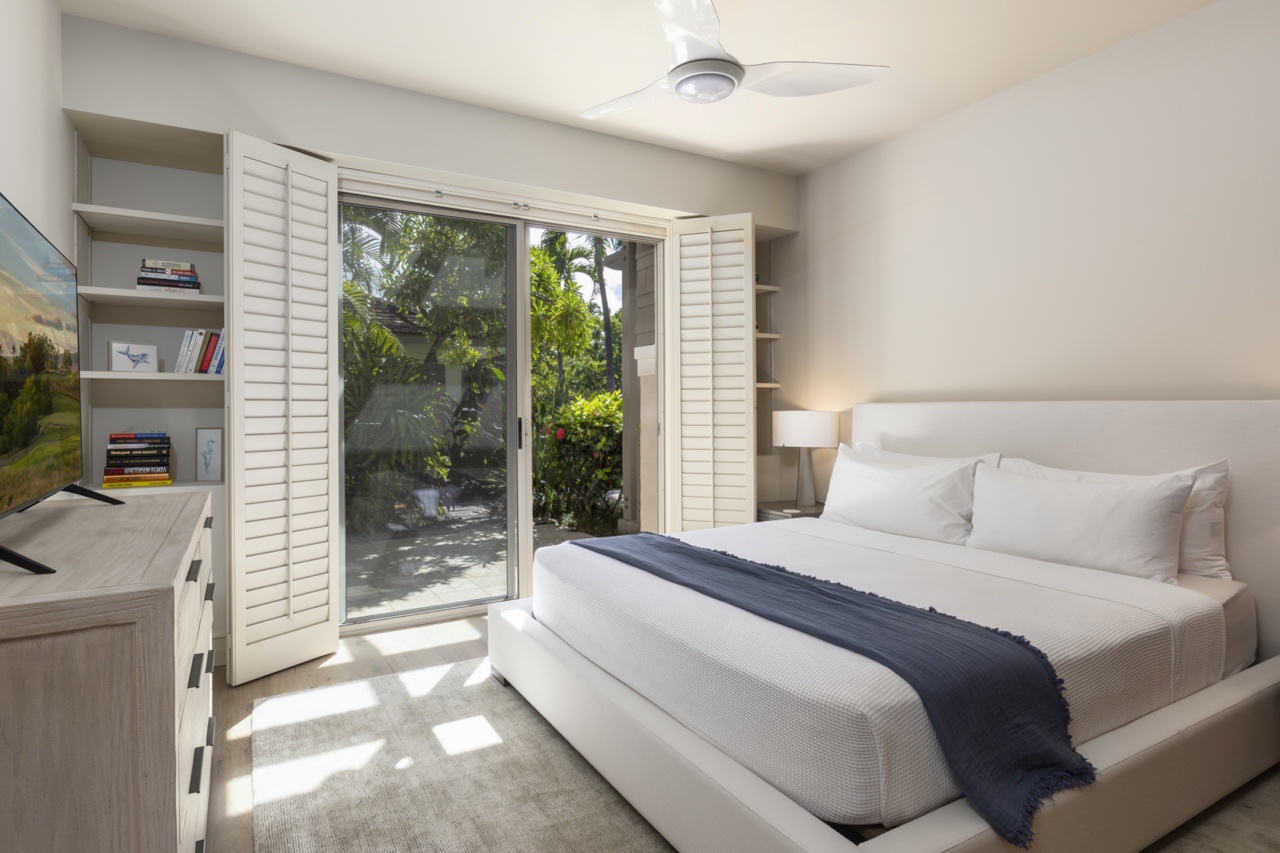 Kailua Kona Vacation Rentals, 3BD Palm Villa (130B) at Hualalai Resort - Second bedroom (lower level) includes a california king bed, smart TV, and exclusive lanai with an adjacent full bath