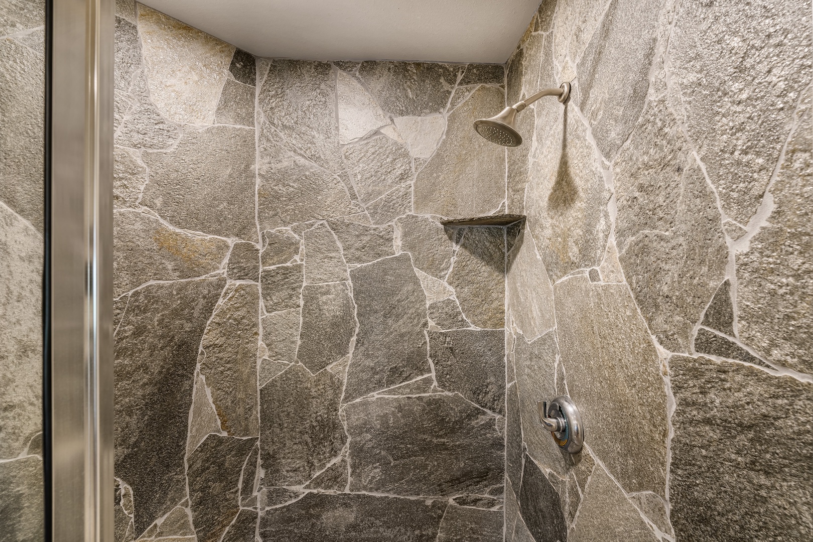 Kailua Kona Vacation Rentals, Ali'i Point #12 - Detached guest bathroom with walk-in stone shower—resort-inspired design and convenience.