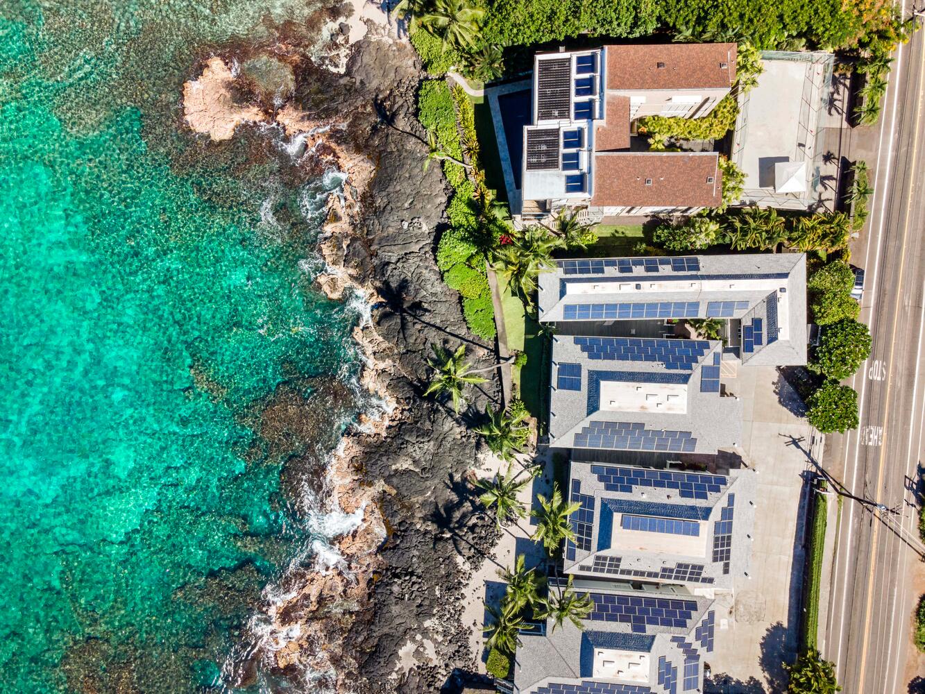 Kailua Kona Vacation Rentals, Hale Kai O'Kona #7 - Overhead view of Hale Kai O’Kona perched along the rugged lava rock shoreline.