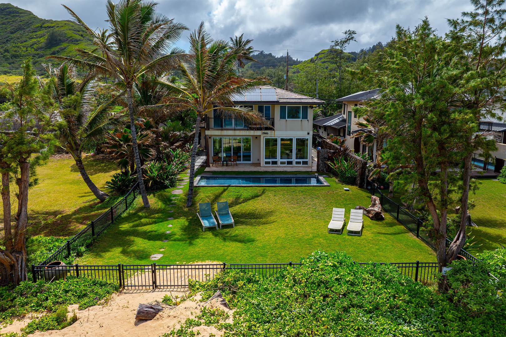 Laie Vacation Rentals, Laie Beachfront Estate - Aerial shot of the backyard.