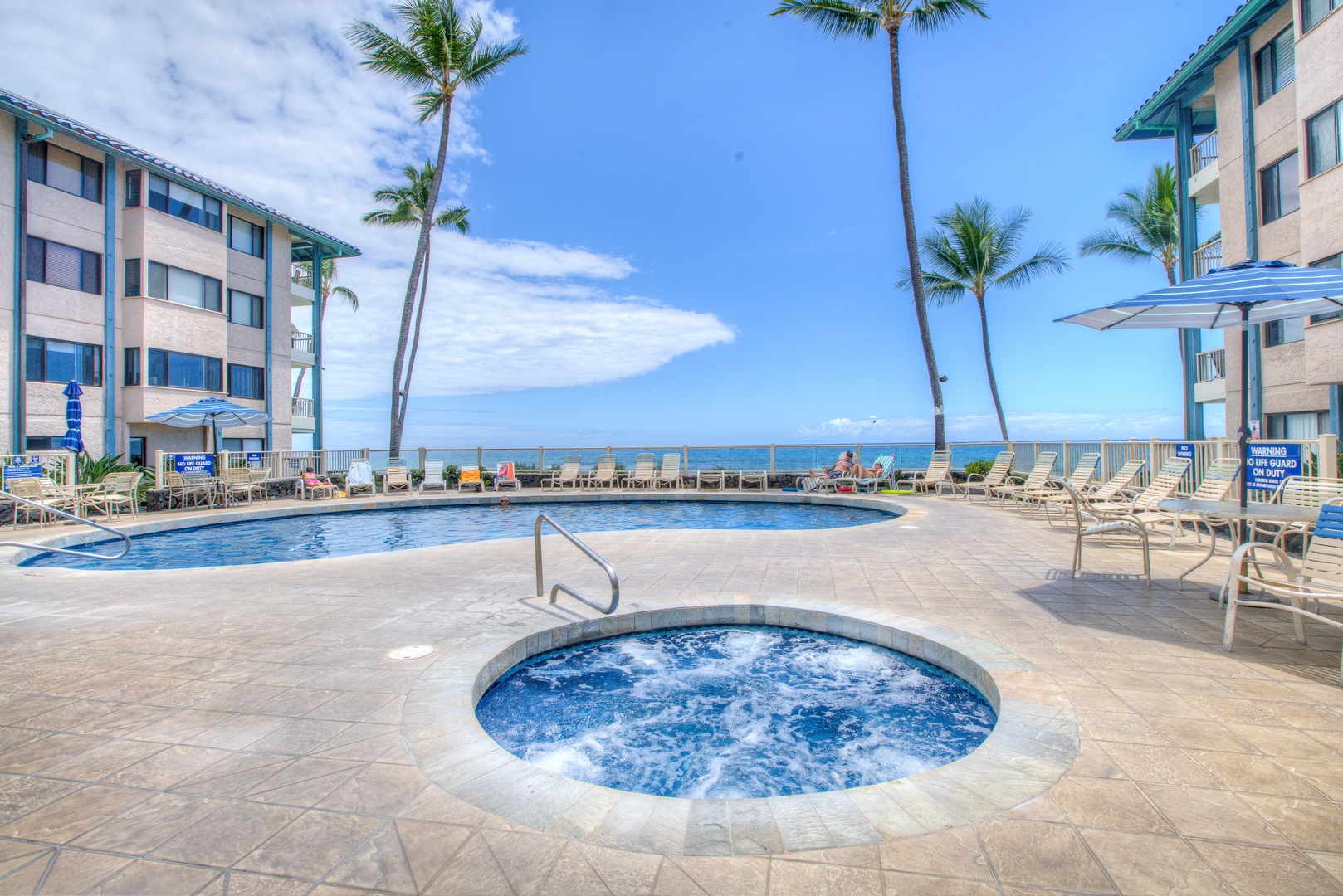 Kailua Kona Vacation Rentals, Kona Reef F11 - View of the Oceanfront Pool Area and Spa at the Kona Reef complex.