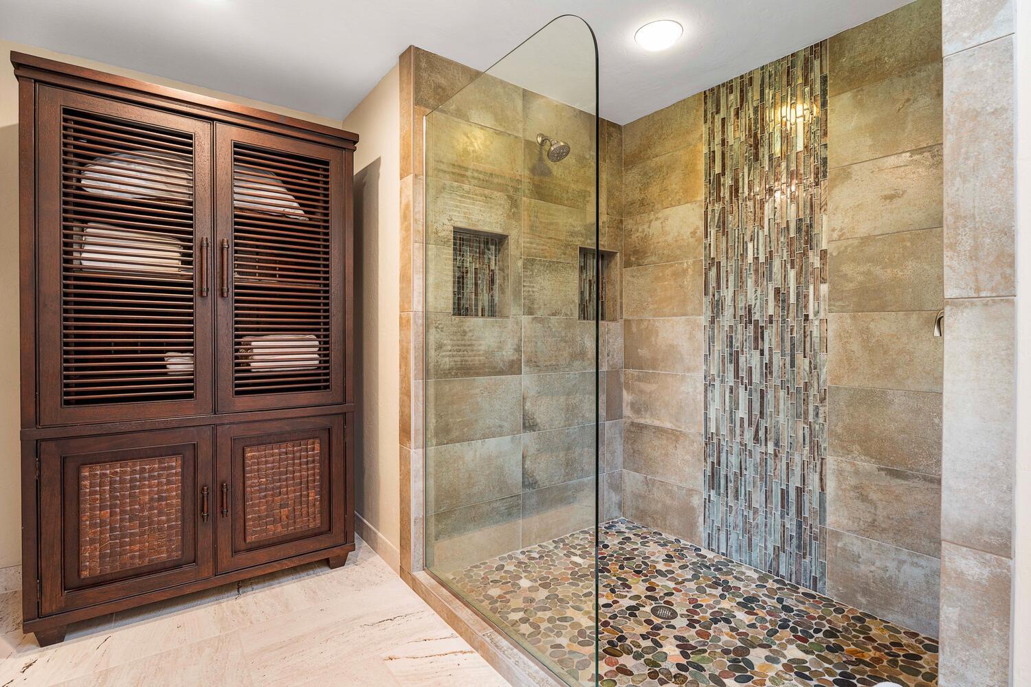 Kailua Kona Vacation Rentals, Kanaloa at Kona 3303 - The large walk in shower features glass enclosure and tile accents.