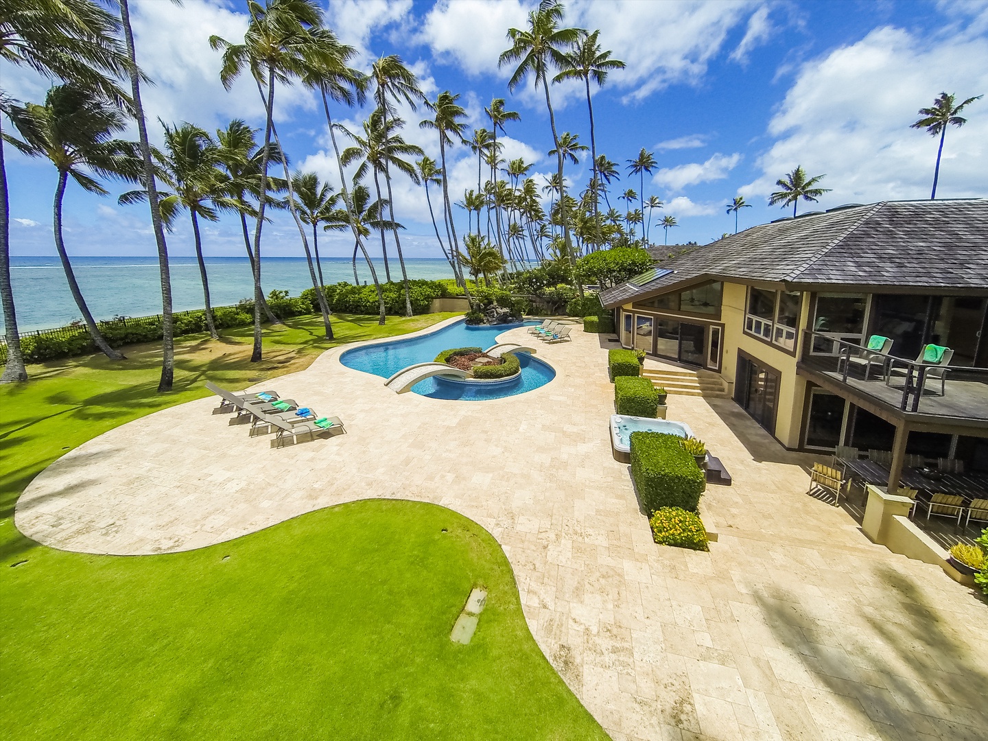 Honolulu Vacation Rentals, Kahala Mini Resort (5BR) - From above, the lawn runs from the lanai roofline all the way to the shoreline.