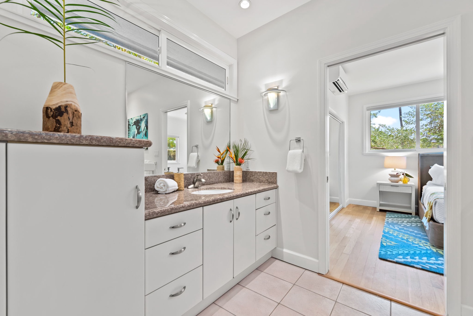 Kailua Vacation Rentals, Kailua Beach House - Shared Jack and Jill bath with double sinks and modern coastal style.