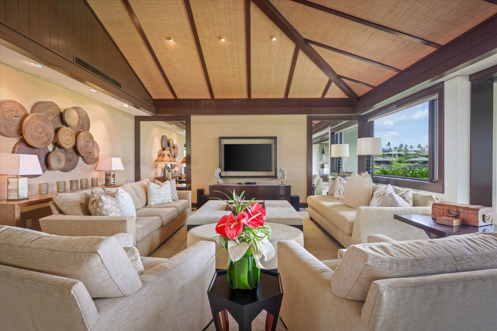 Kailua Kona Vacation Rentals, Wai'ulu Villa 115D - Inspired by “The End of a Perfect Day,” this artful living area harmonizes warmth, luxury, and Hawaiian design.
