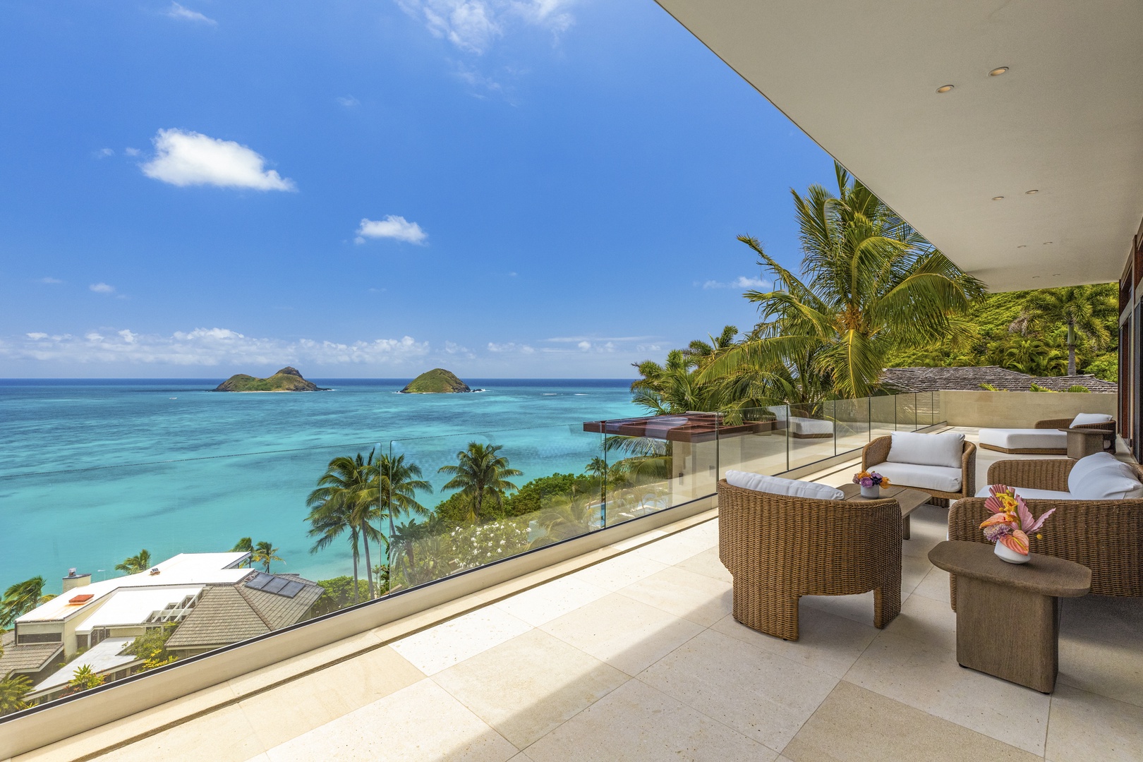 Kailua Vacation Rentals, Lanikai Hillside Estate - Spacious outdoor entertaining area with shaded seating and stunning ocean vistas.