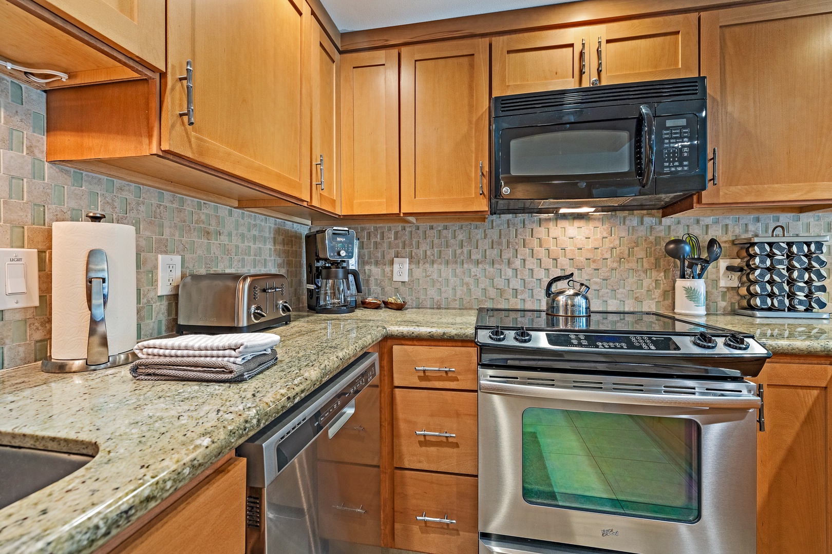 Lahaina Vacation Rentals, Kahana Sunset B4B - The kitchen is equipped with stainless steel appliances, granite countertops, and all the essentials for preparing meals.