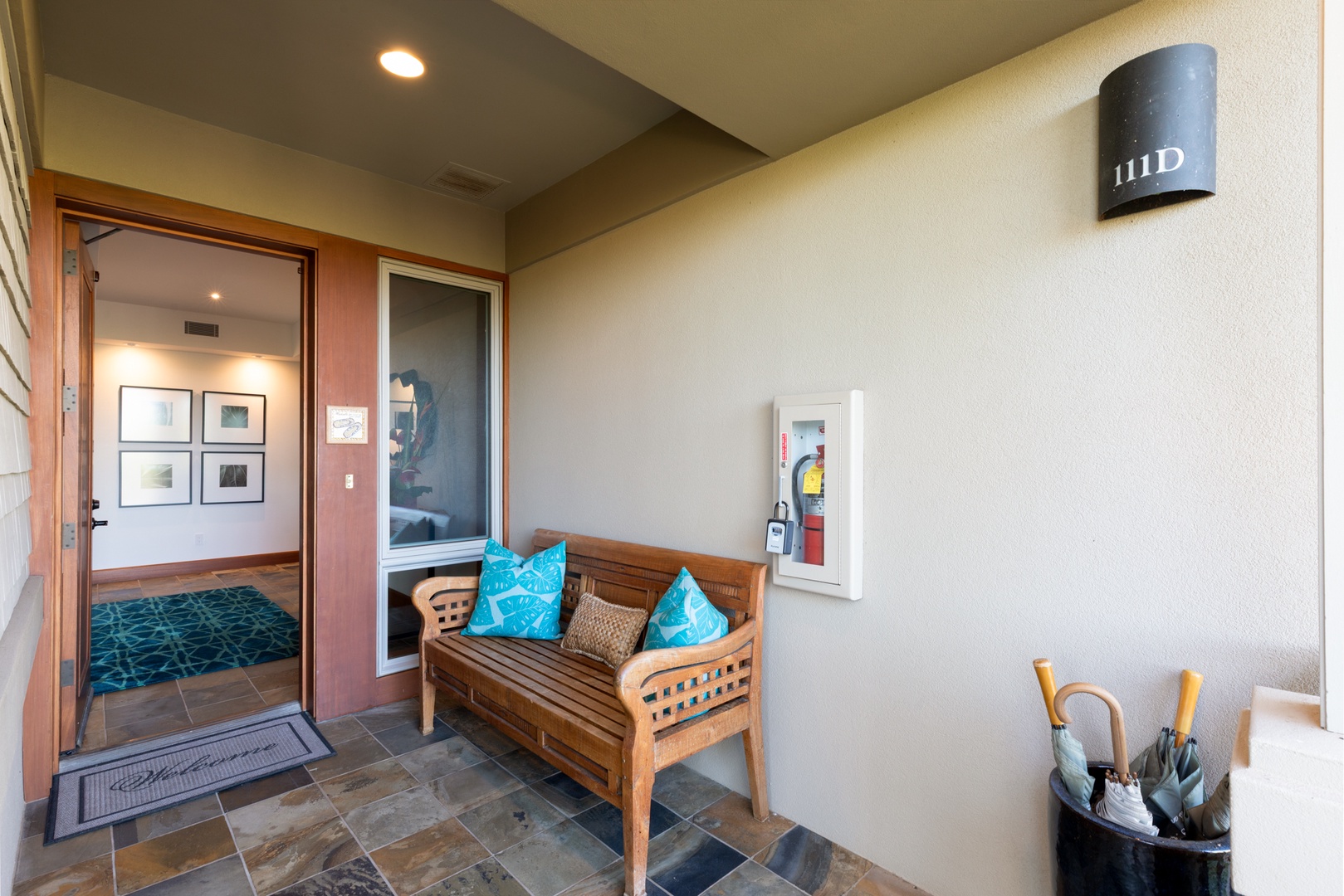 Kailua Kona Vacation Rentals, 3BD Waiulu Villa (111D) at Hualalai Resort - Your private entrance welcomes you with comfortable seating and thoughtful touches, setting the perfect tone for your stay.