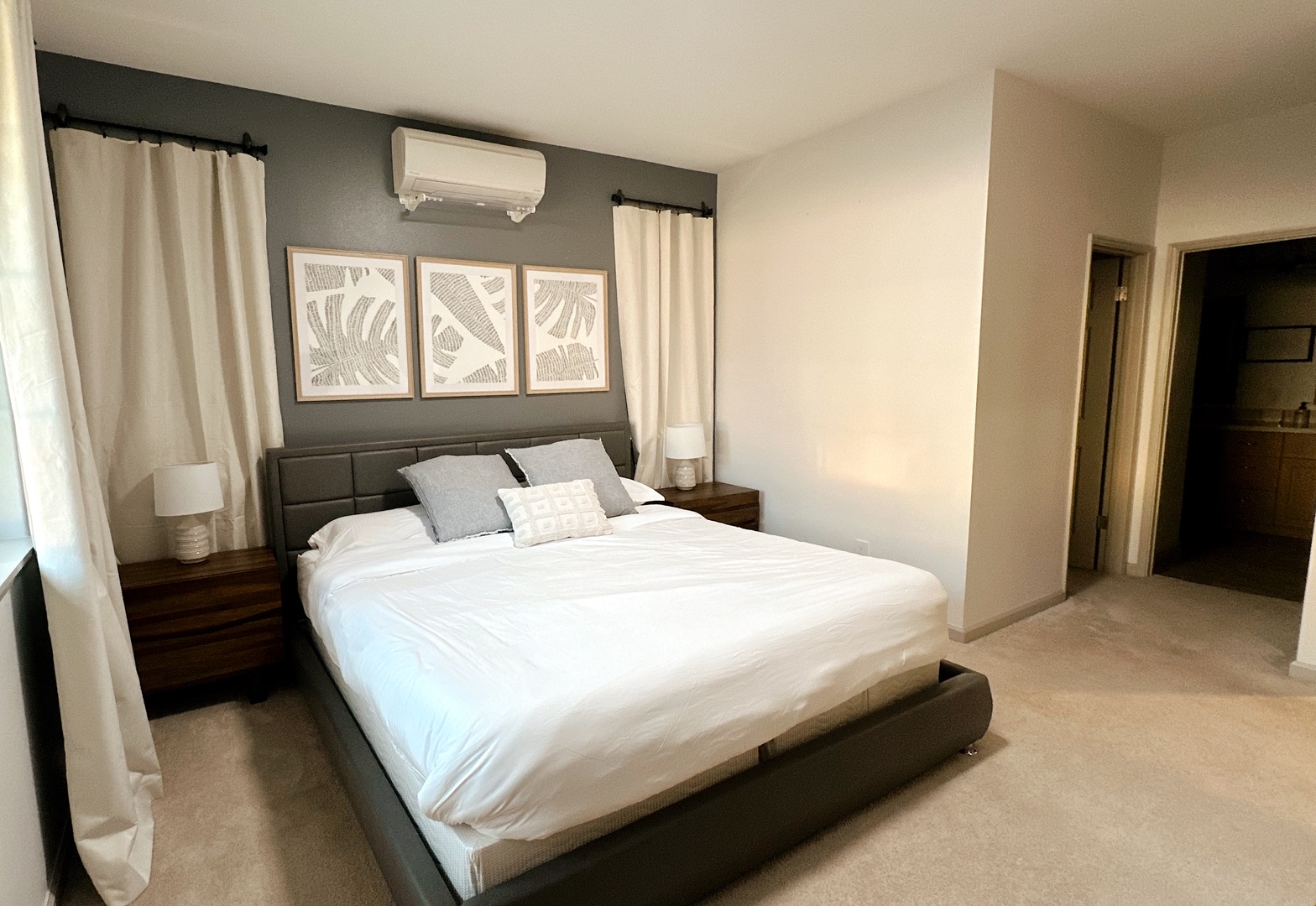 Makaha Valley Vacation Rentals, Makaha Valley Hale Kai** - Spacious bedroom with king bed, soft linens, and calming neutral tones.